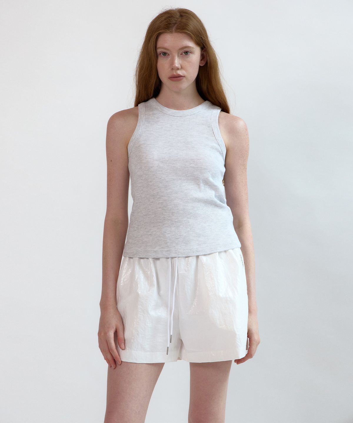 네벨에브리웨어(NEBELEVERYWEAR) Waffle Sleeveless Top (4 Color)