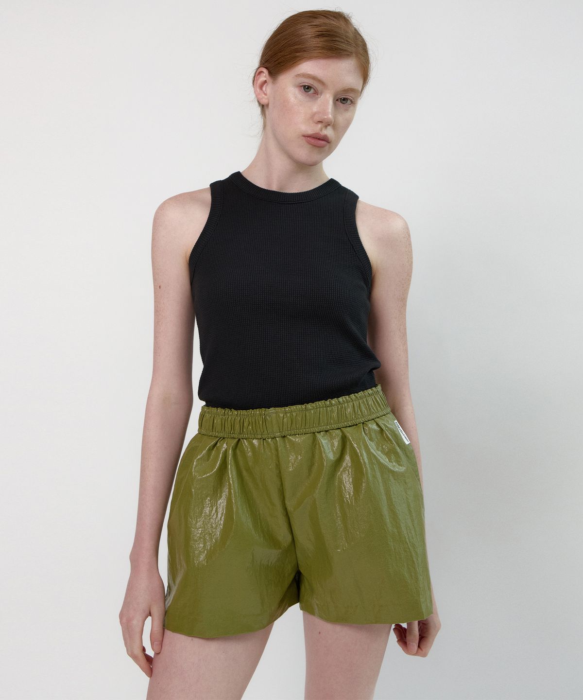 네벨에브리웨어(NEBELEVERYWEAR) Waffle Sleeveless Top (4 Color)