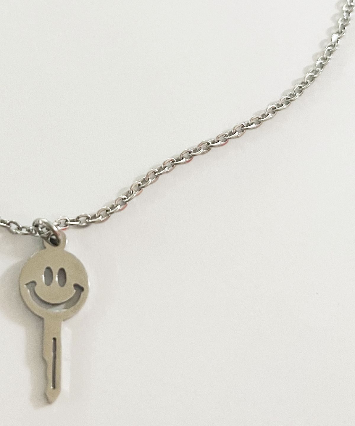 스케이터락(SK8ER ROCK) Smiley Key Surgical Steel Necklace ((Steel))