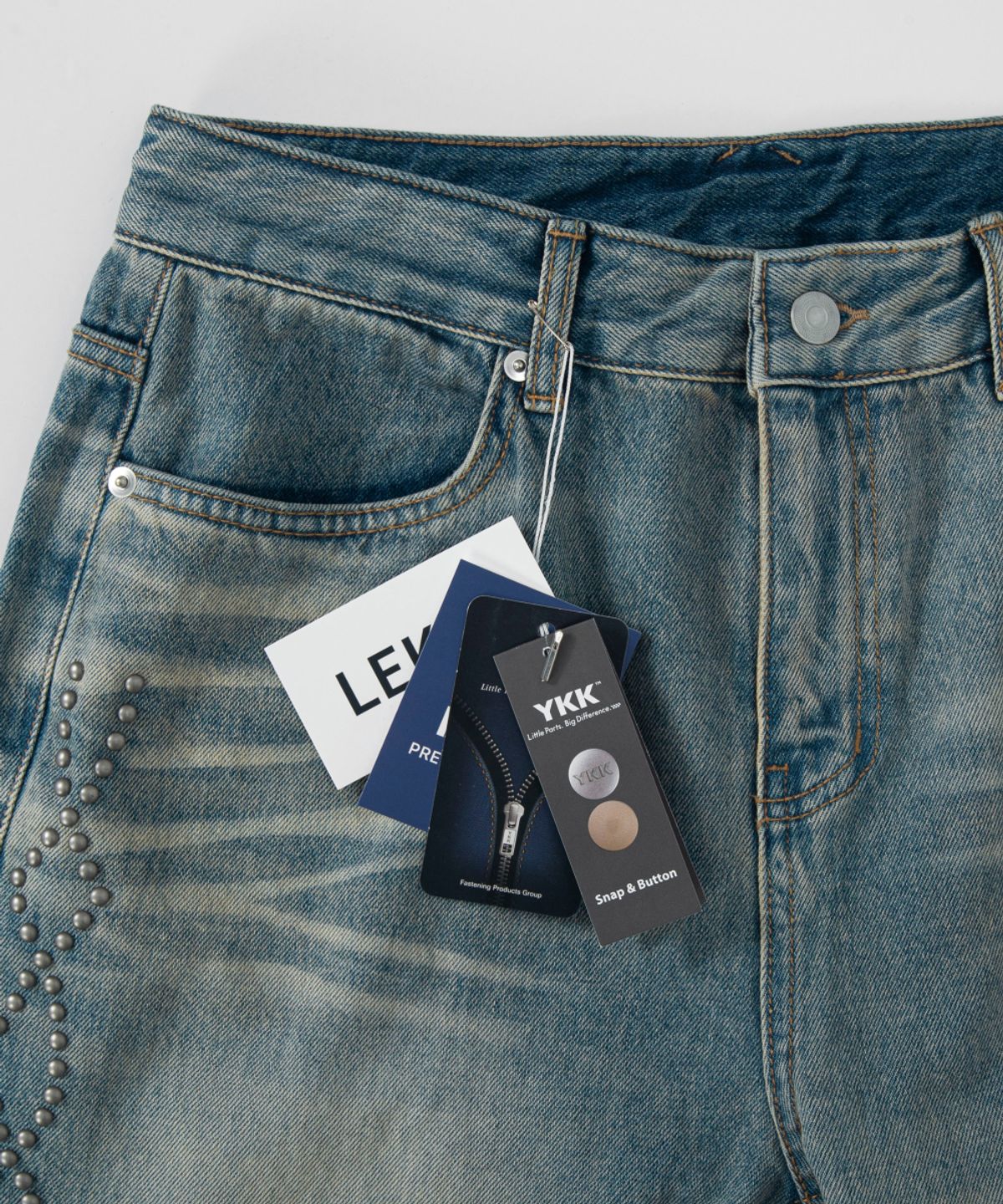 레킴(LEKIM) 웨스턴 스터드 데님 팬츠 연청