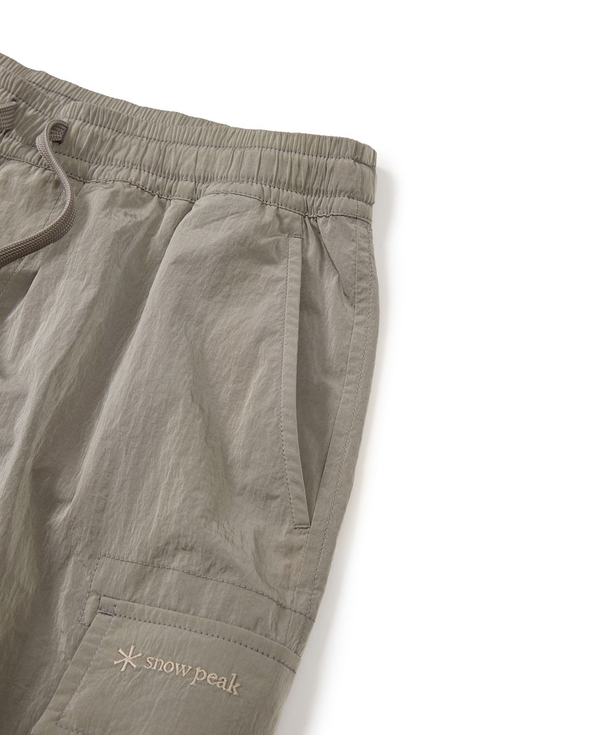 스노우피크 어패럴(SNOWPEAK APPAREL) 브라이트 카고 조거 팬츠 (S24FUFPT70) Tan Gray