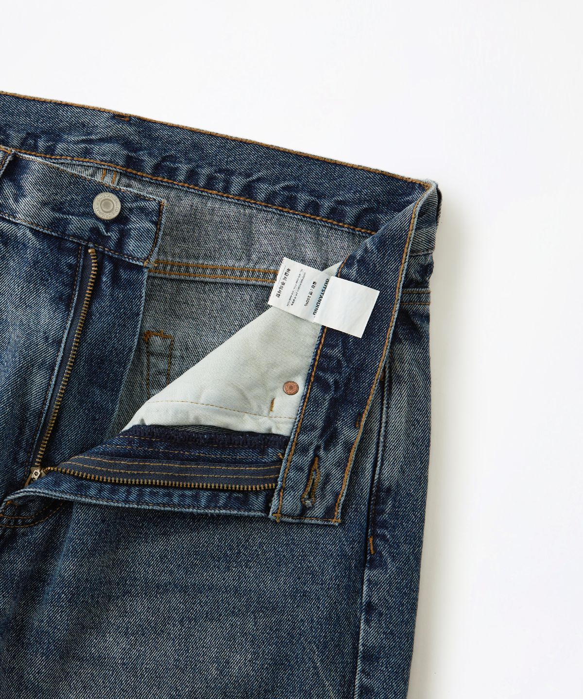 아웃스탠딩(OUTSTANDING) TAPERED LOOSE FIT DENIM PANTS_L.BLUE