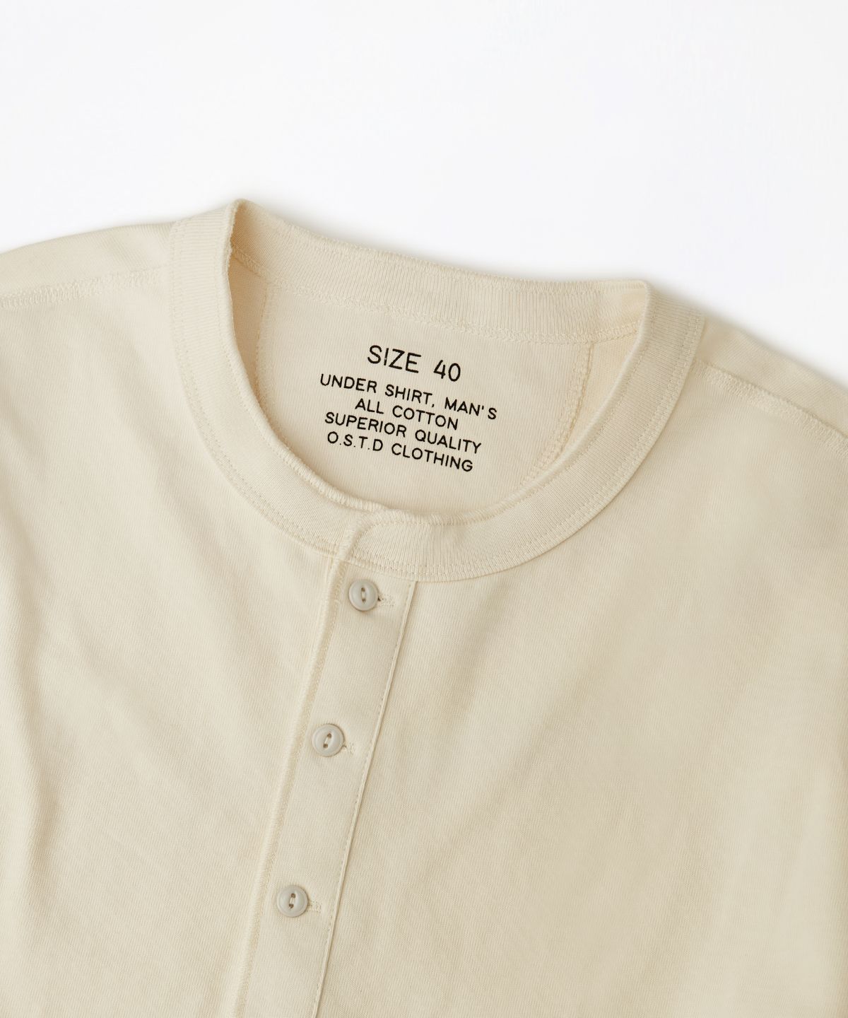 아웃스탠딩(OUTSTANDING) HENLEY NECK LONG SLEEVE TEE_NATURAL