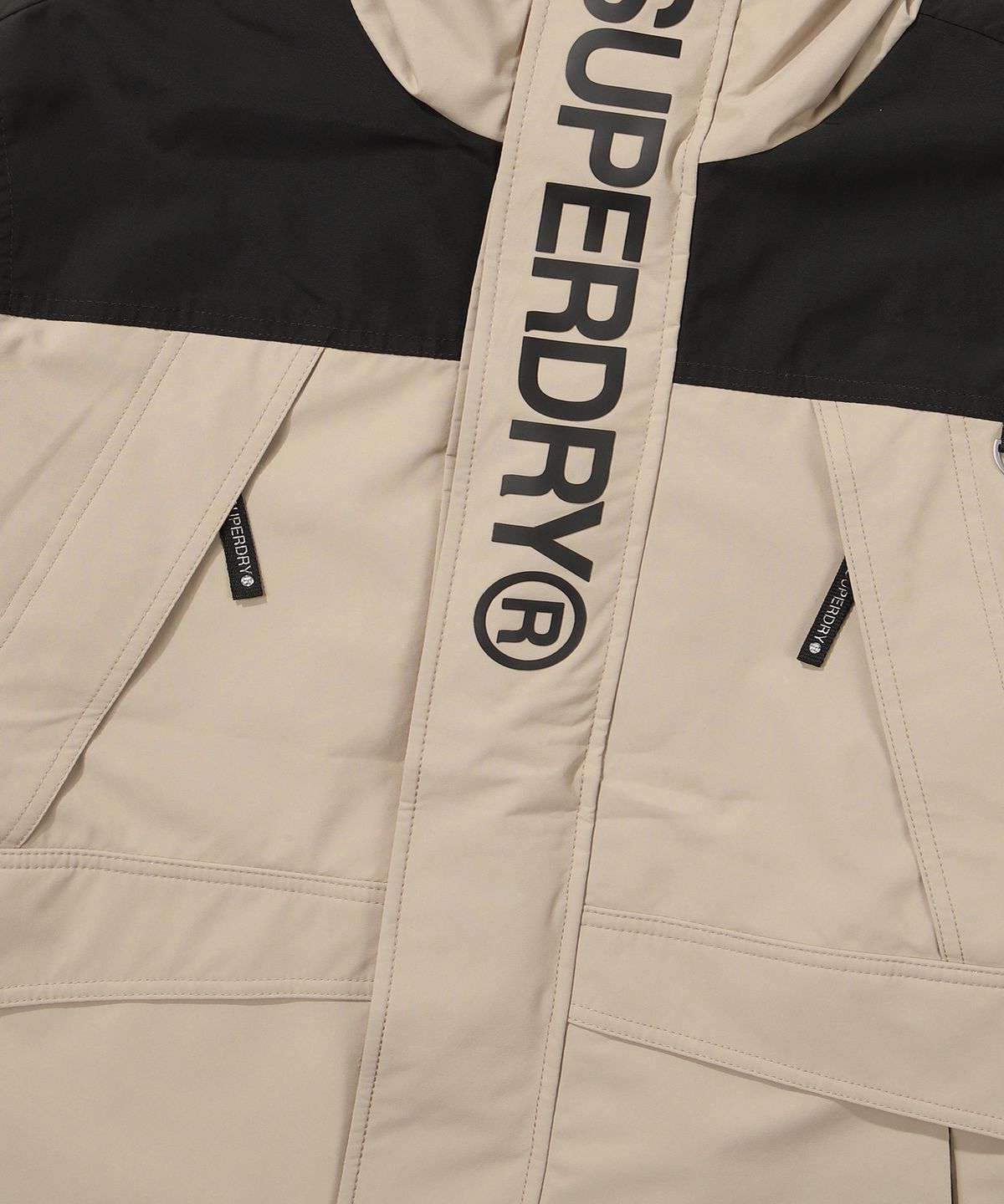 슈퍼드라이(SUPERDRY) 시그니처 윈드치터 자켓 베이지