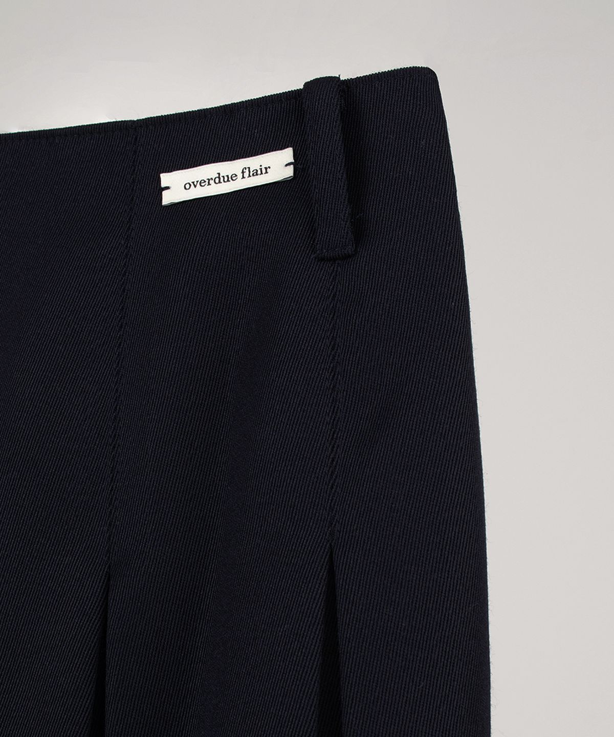 오버듀플레어(OVERDUEFLAIR) WOOL PLEATED SKIRT_NAVY