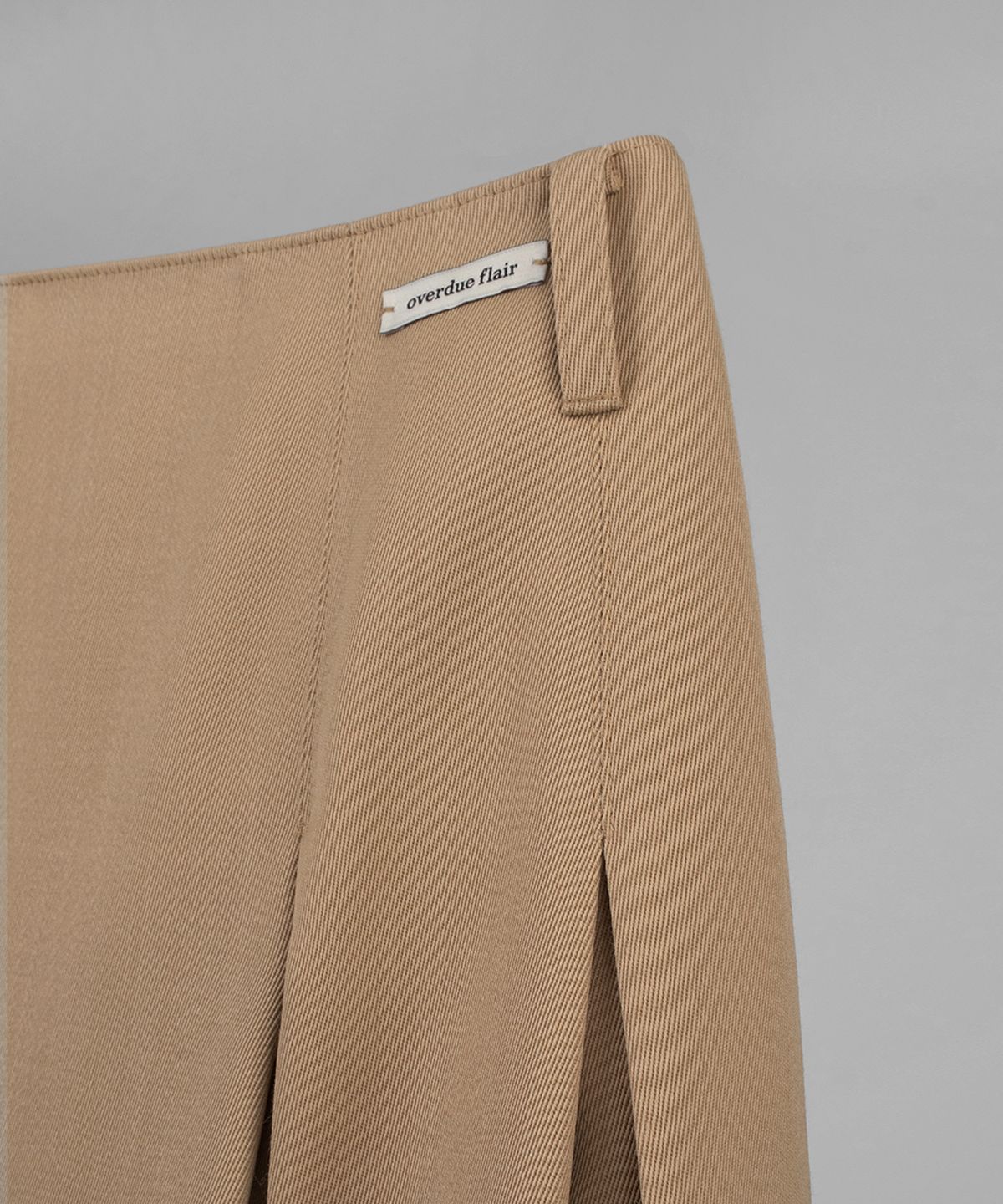 오버듀플레어(OVERDUEFLAIR) WOOL PLEATED SKIRT_BEIGE