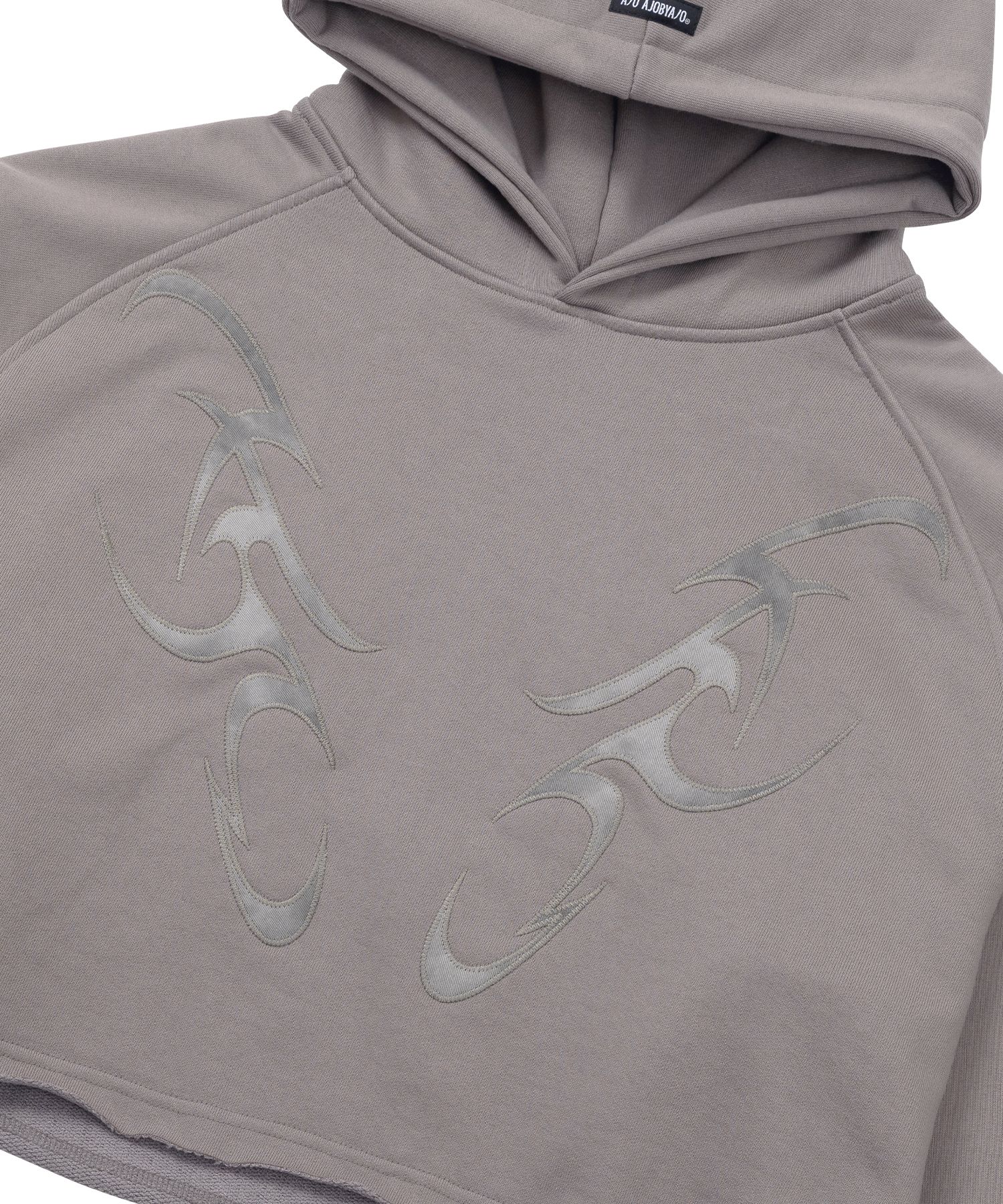 【AJO AJOBYAJO】24FW★ Tribal AJO Applique Cropped Hoodie MUSINSA | AJOBYAJO Tribal AJO Applique Cropped Hoodie [DUSTY