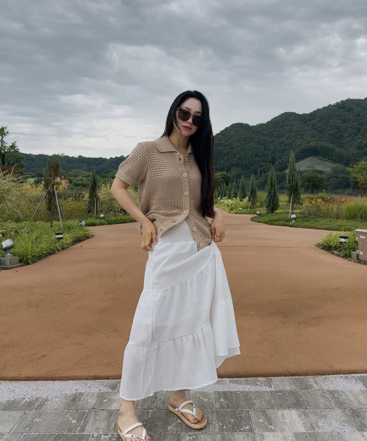 셀리티오(SELITIO) 여성 펀칭 카라 니트 가디건 베이지