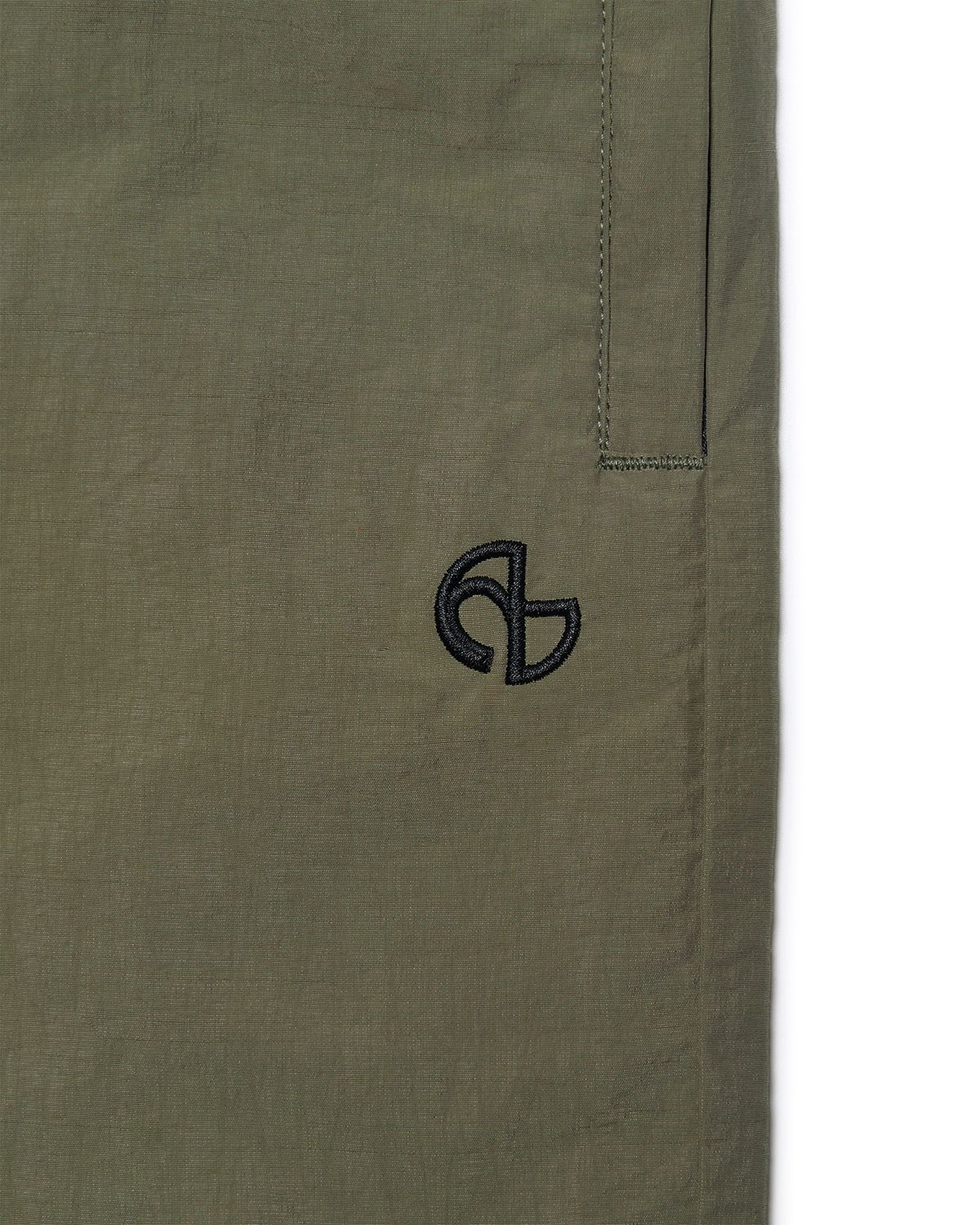 노매뉴얼(NOMANUAL) T.N.D NYLON PANTS - KHAKI