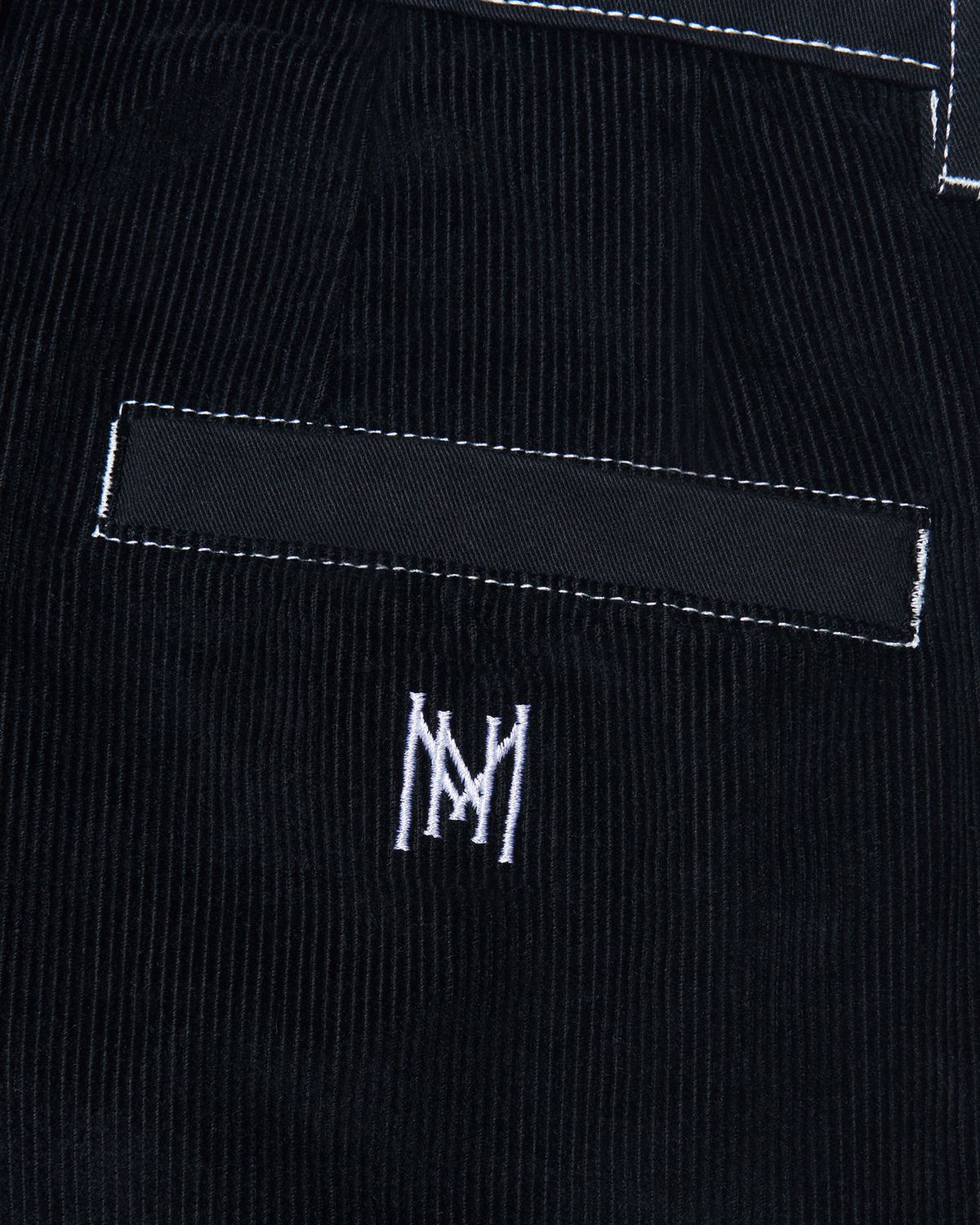 노매뉴얼(NOMANUAL) HALF & HALF CORDUROY PANTS - BLACK
