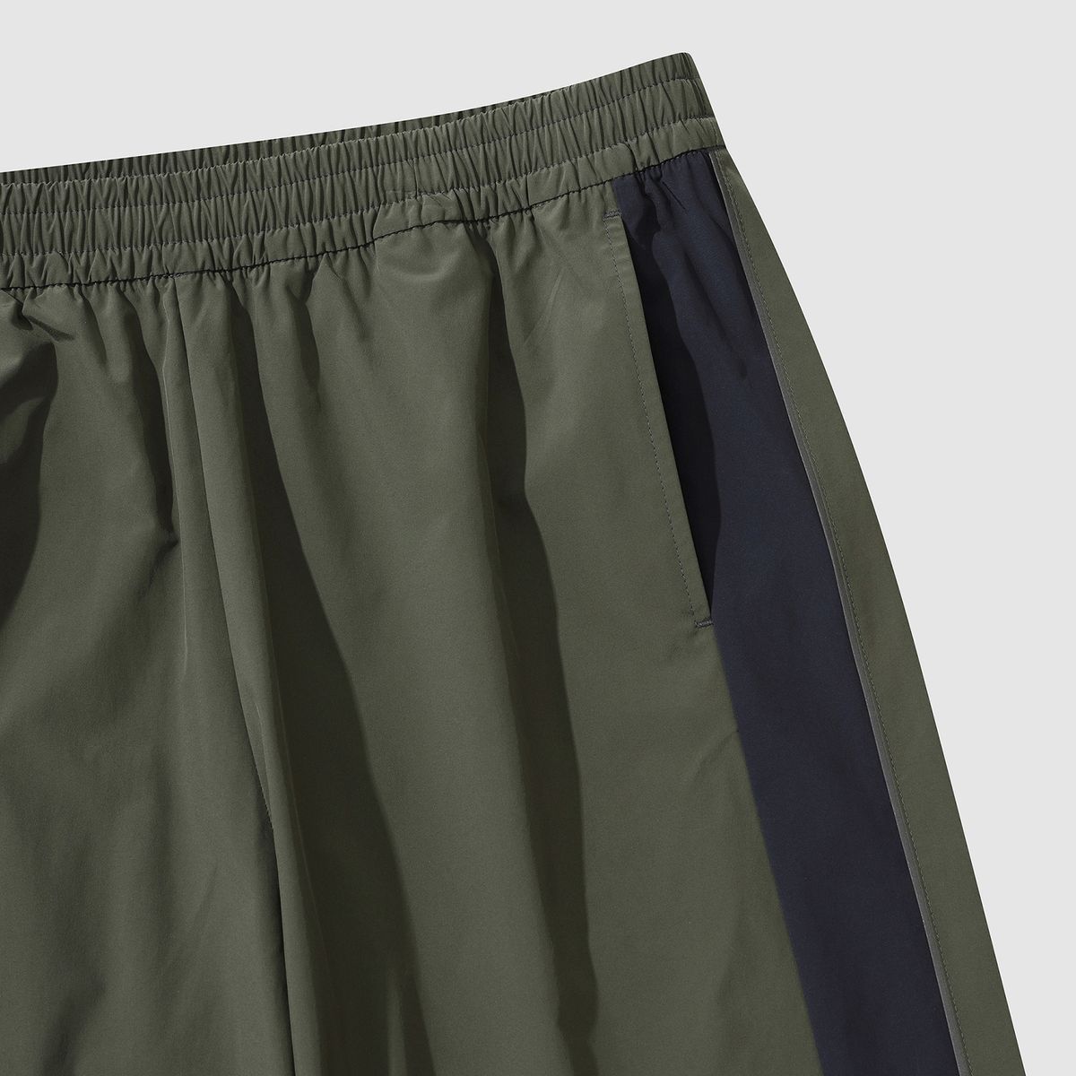 엄브로(UMBRO) 퓨쳐리즘 우븐 와이드 & 조거 2WAY 팬츠 카키(UP321CPT92)