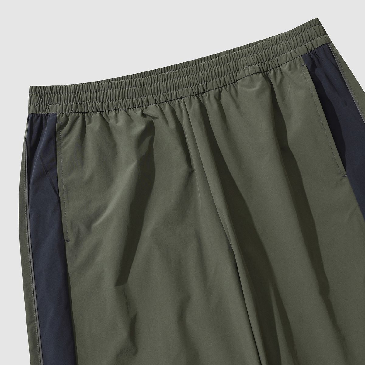엄브로(UMBRO) 퓨쳐리즘 우븐 와이드 & 조거 2WAY 팬츠 카키(UP321CPT92)