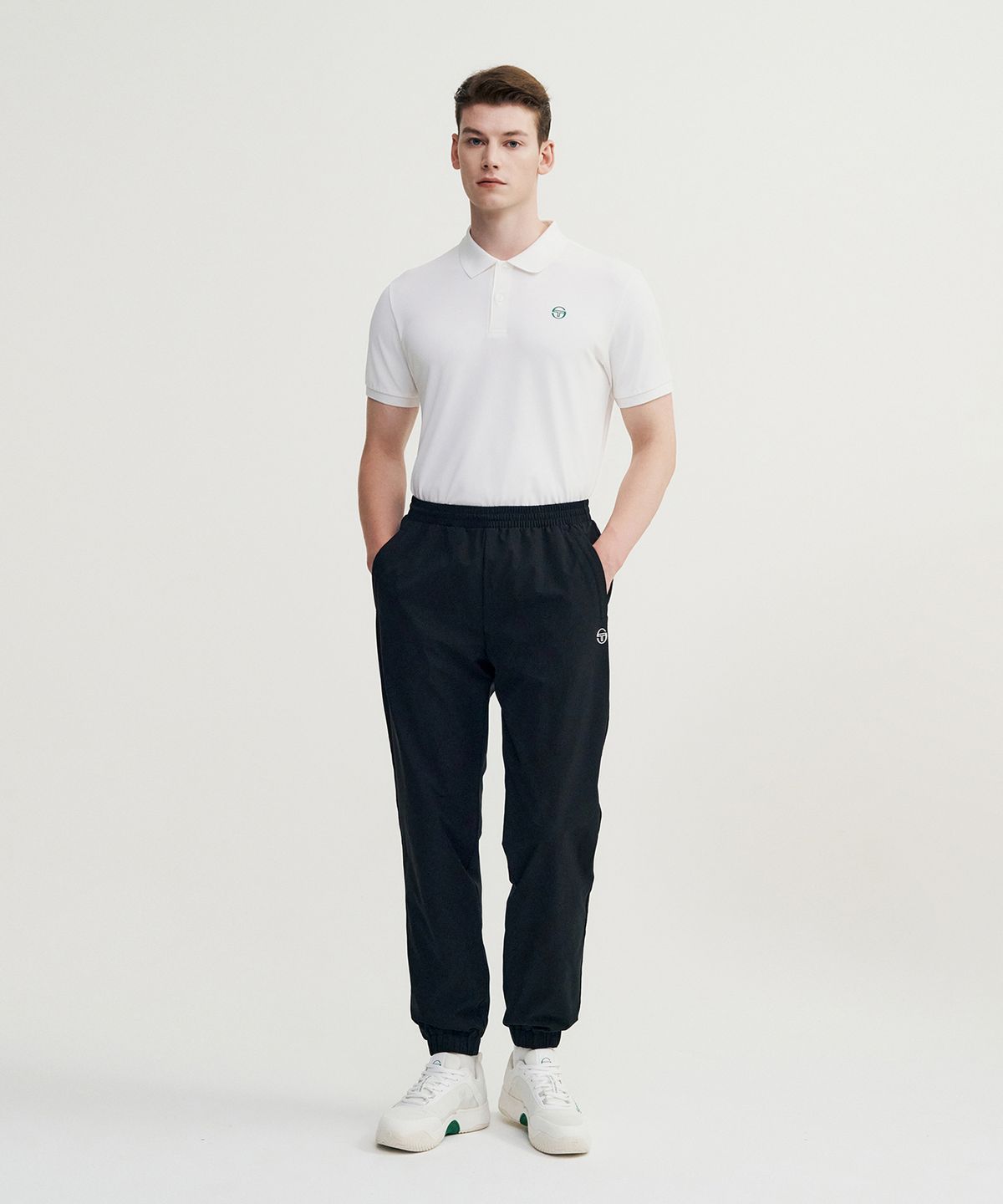 세르지오 타키니(SERGIO TACCHINI) M 에센셜 웜업 조거 팬츠 (Black)