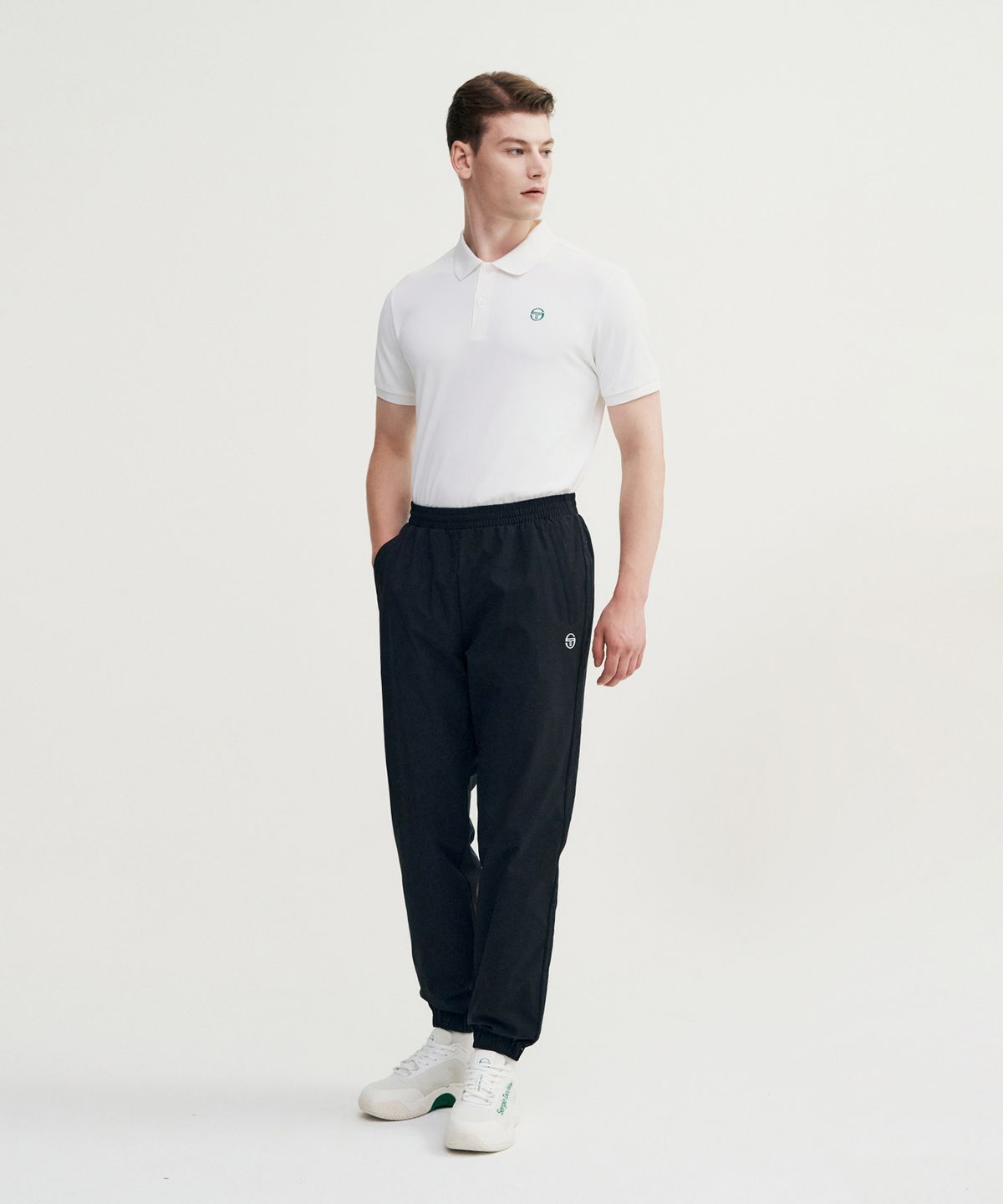 세르지오 타키니(SERGIO TACCHINI) M 에센셜 웜업 조거 팬츠 (Black)