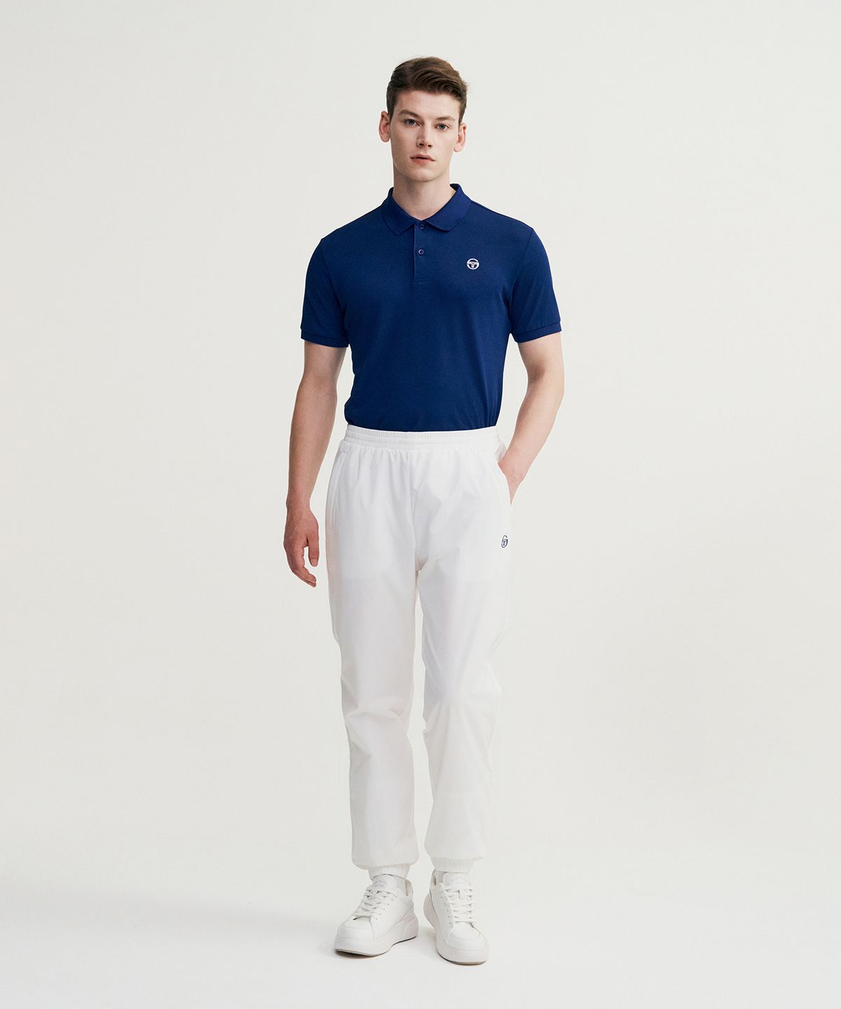 세르지오 타키니(SERGIO TACCHINI) M 에센셜 웜업 조거 팬츠 (White)