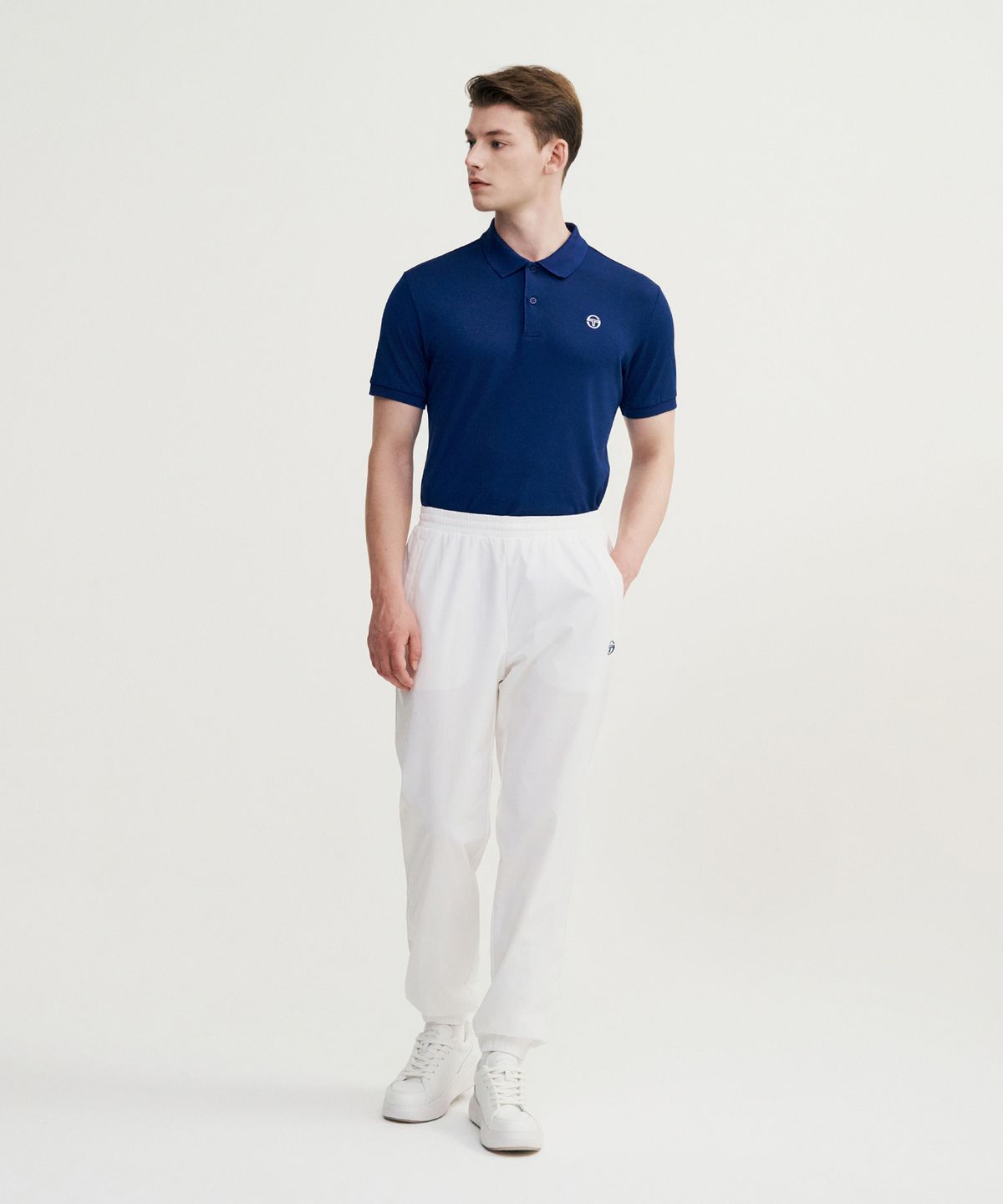 세르지오 타키니(SERGIO TACCHINI) M 에센셜 웜업 조거 팬츠 (White)