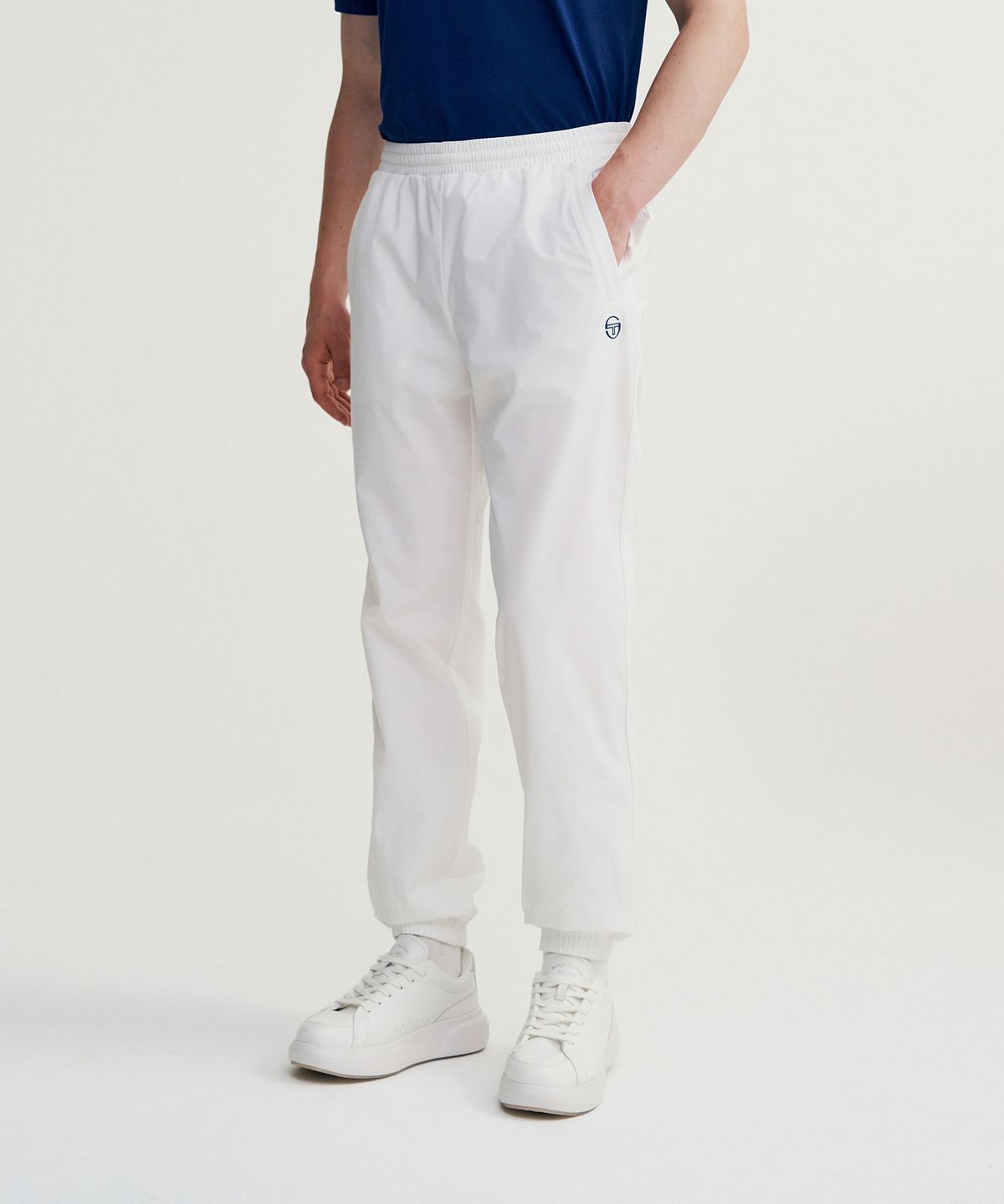 세르지오 타키니(SERGIO TACCHINI) M 에센셜 웜업 조거 팬츠 (White)