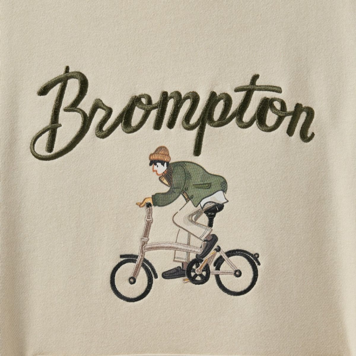 브롬톤 런던(BROMPTON LONDON) CYCLING GRAPHIC HOOD T-SHIRT - BUTTER (P243UHD403)