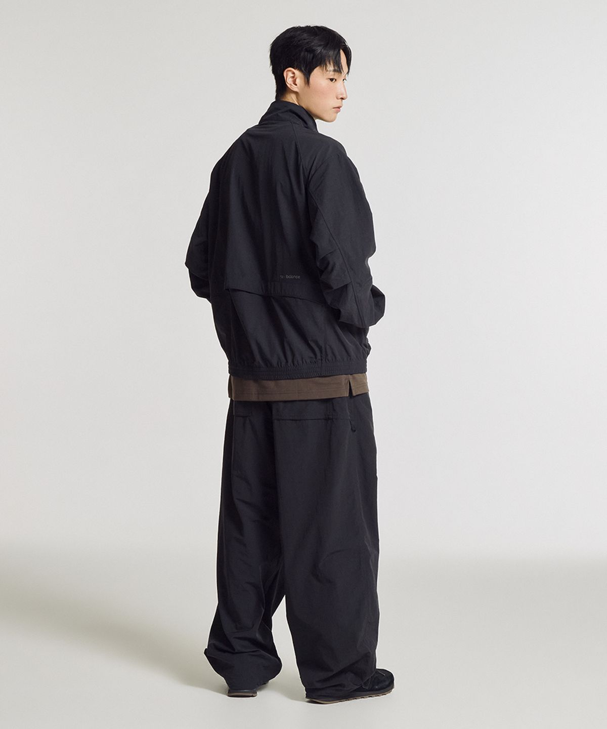 뉴발란스(NEW BALANCE) NBNAG31803 / UNI 에센셜 헤리티지 스탠드넥 웜업자켓 (BLACK)