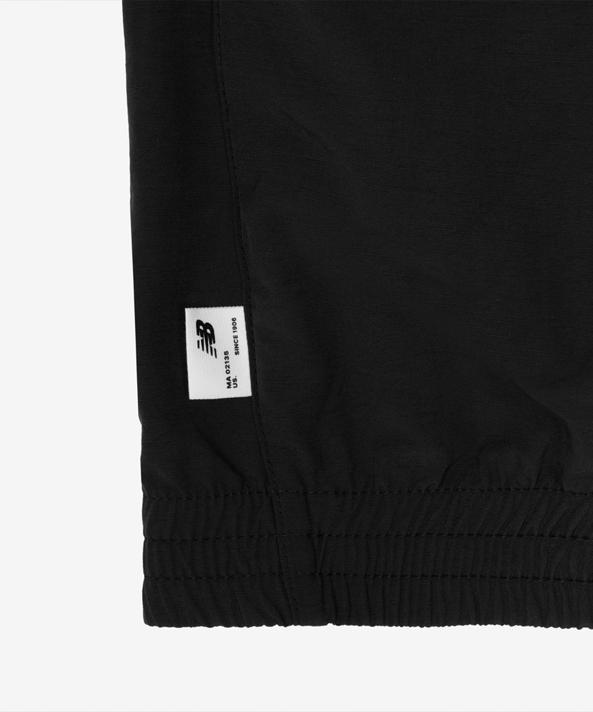 뉴발란스(NEW BALANCE) NBNAG31803 / UNI 에센셜 헤리티지 스탠드넥 웜업자켓 (BLACK)