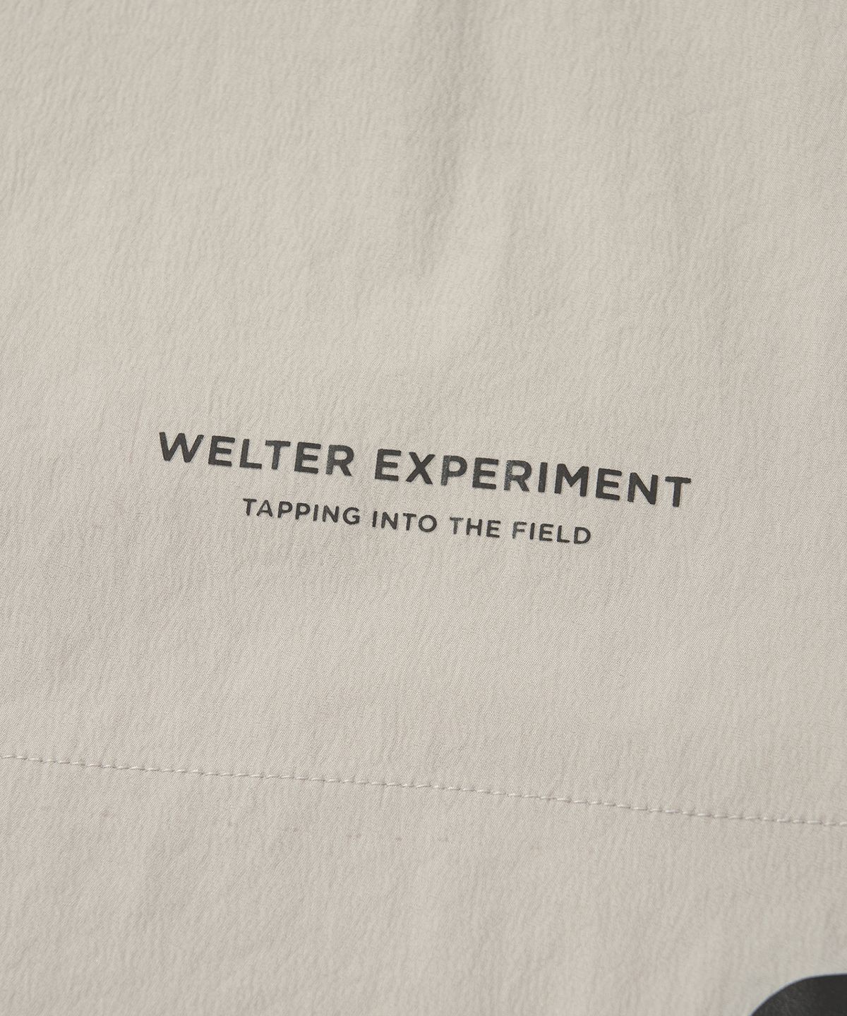 웰터 익스페리먼트(WELTER EXPERIMENT) ATTABAD STRETCH WINDBREAK PULLOVER_LIGHT GRAY_WLT031
