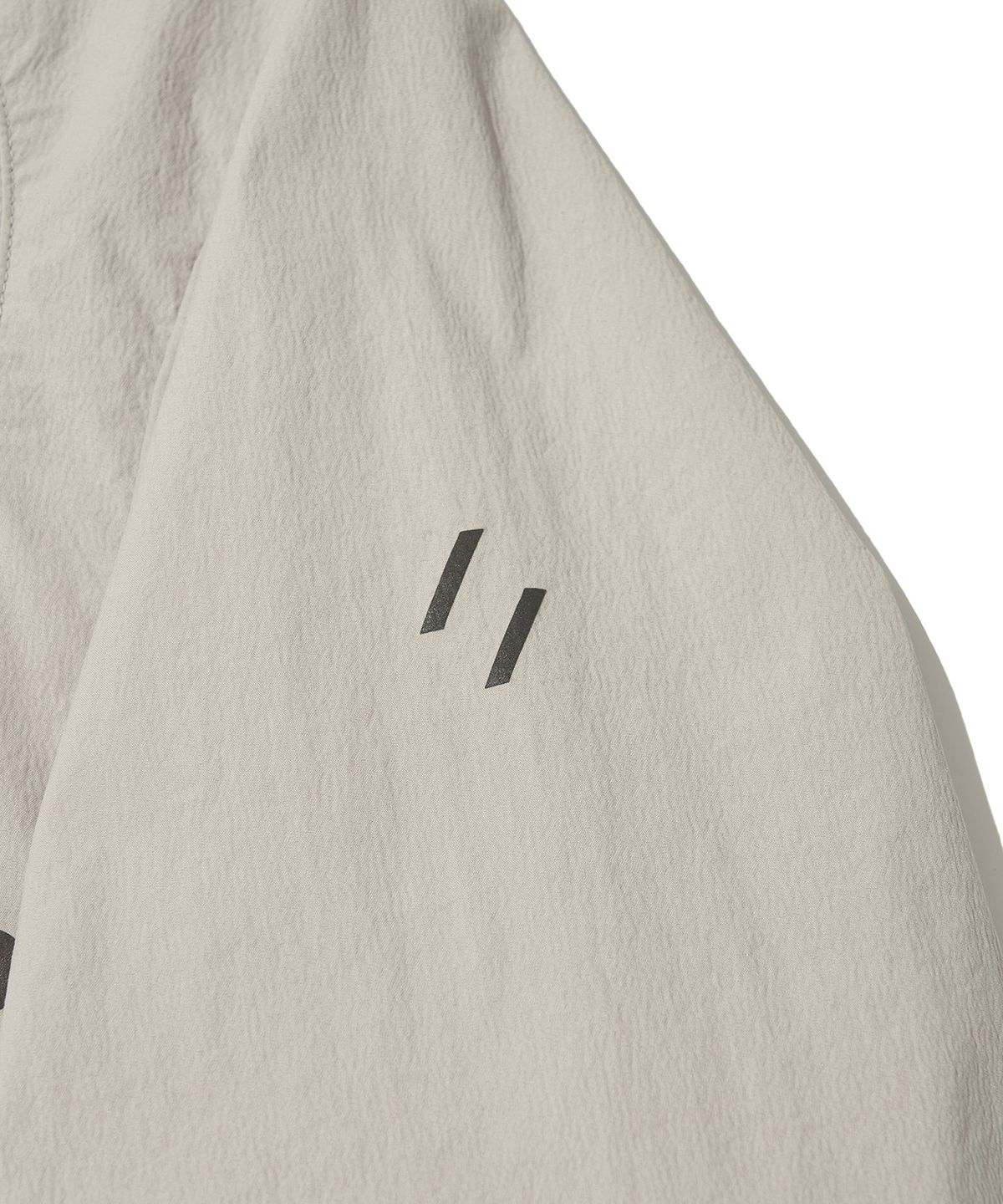 웰터 익스페리먼트(WELTER EXPERIMENT) ATTABAD STRETCH WINDBREAK PULLOVER_LIGHT GRAY_WLT031