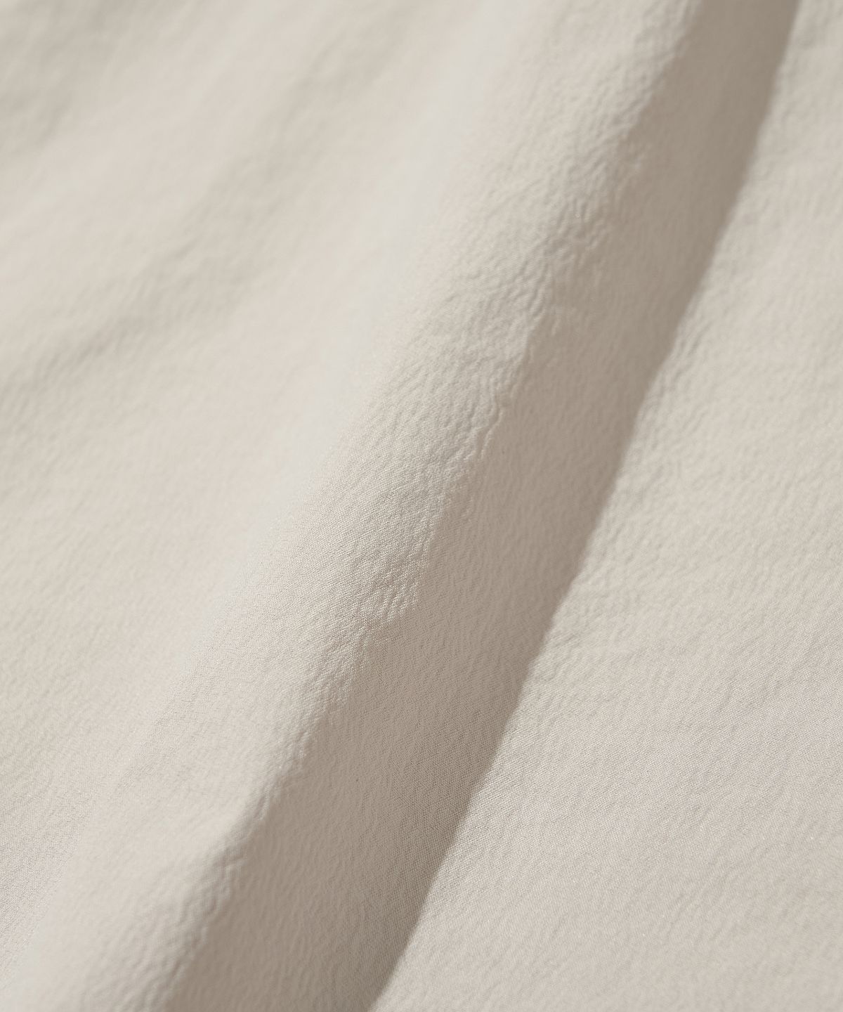 웰터 익스페리먼트(WELTER EXPERIMENT) ATTABAD STRETCH WINDBREAK PULLOVER_LIGHT GRAY_WLT031