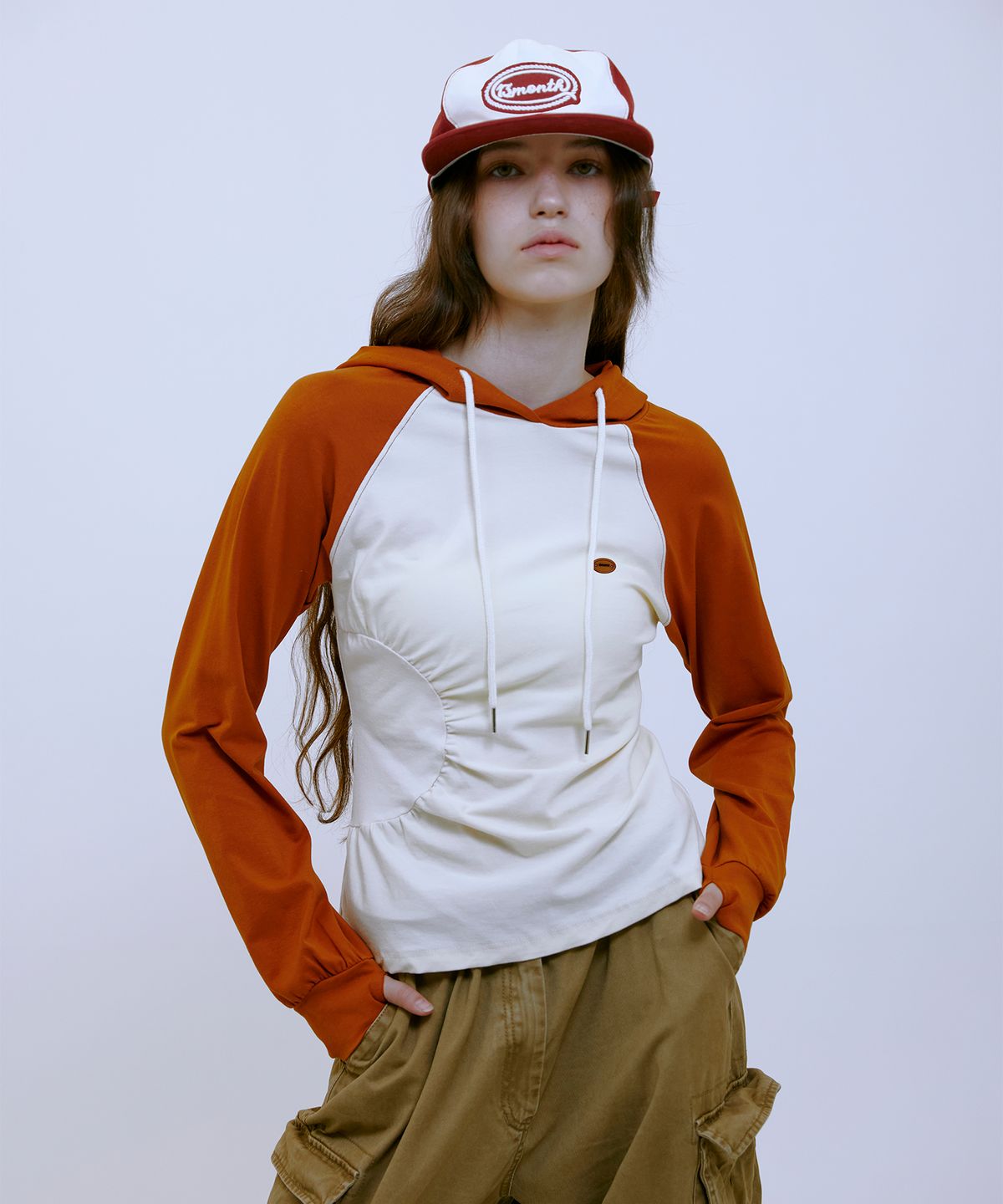 써틴먼스(13MONTH) Asymmetric Ruched Hoodie (ORANGE)