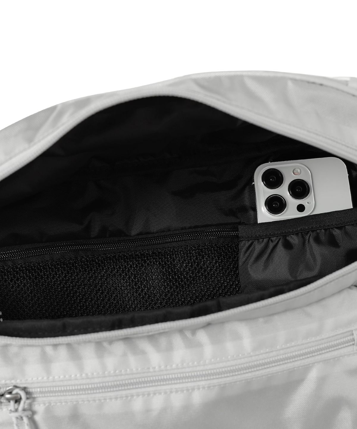 디스이즈네버댓(THISISNEVERTHAT) Washed Nylon Lumbar Pack Cream