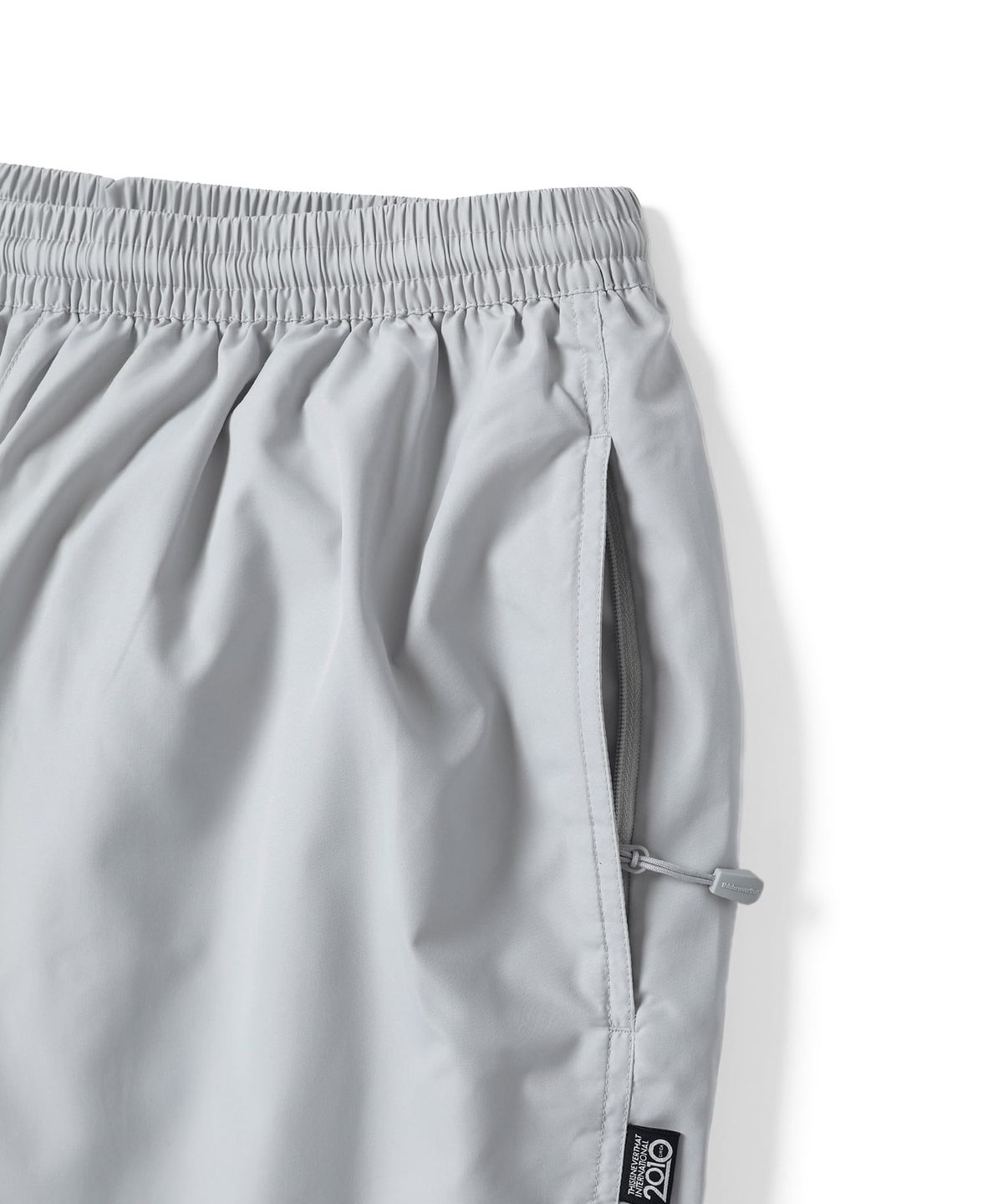디스이즈네버댓(THISISNEVERTHAT) Warm Up Pant Light Grey
