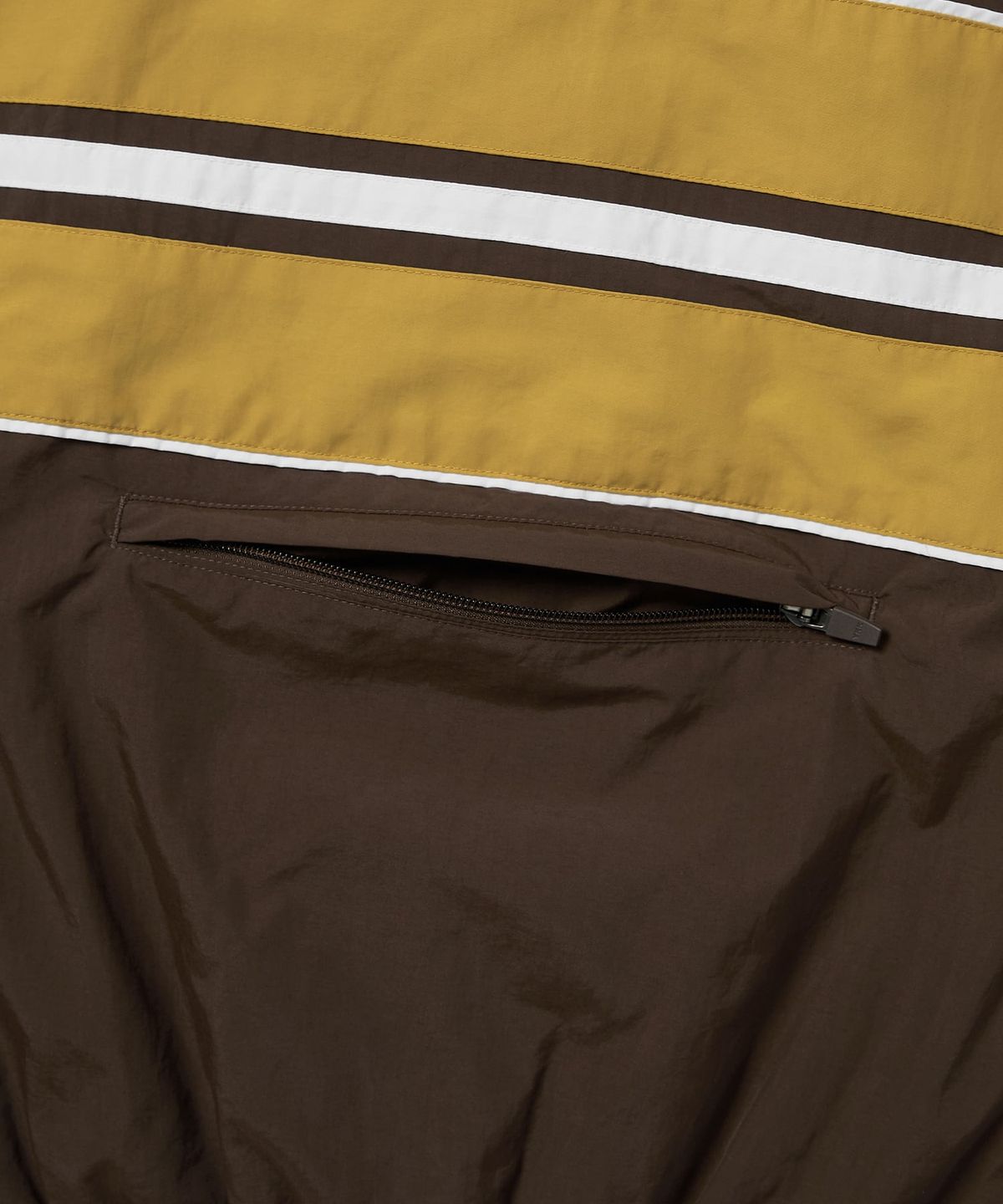 디스이즈네버댓(THISISNEVERTHAT) Sport Wind Jacket Brown
