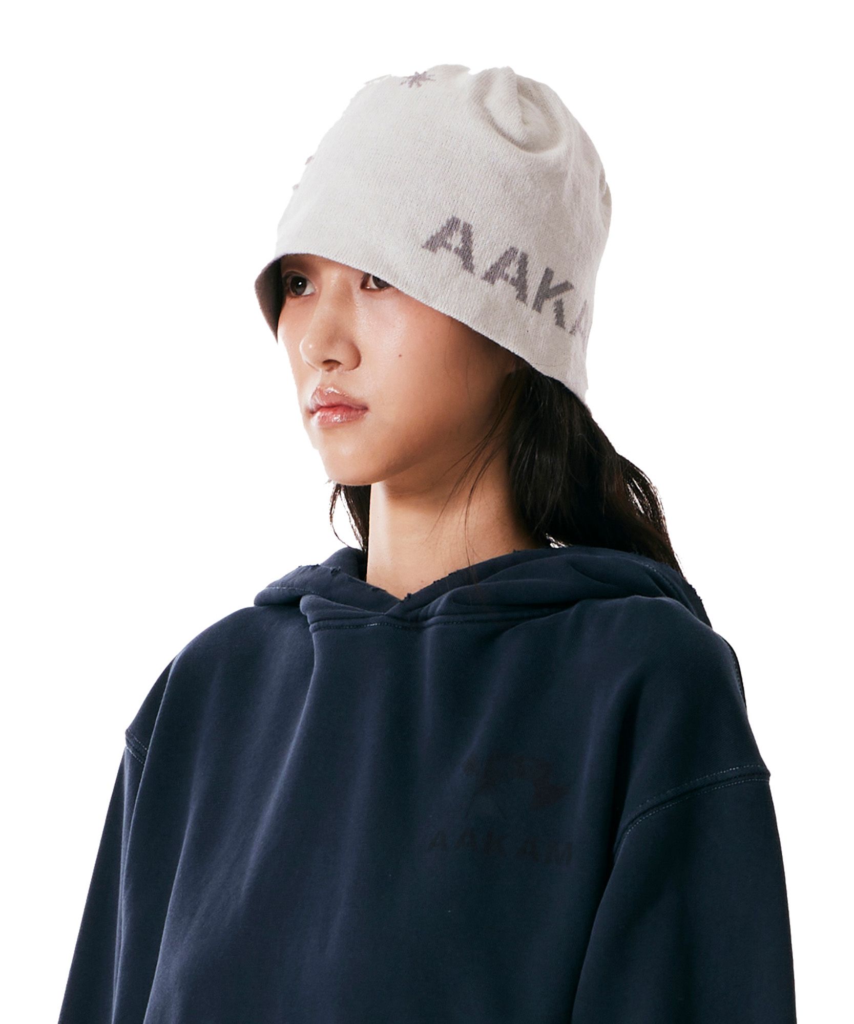 MUSINSA | AAKAM Sun Jacquard Beanie (White)