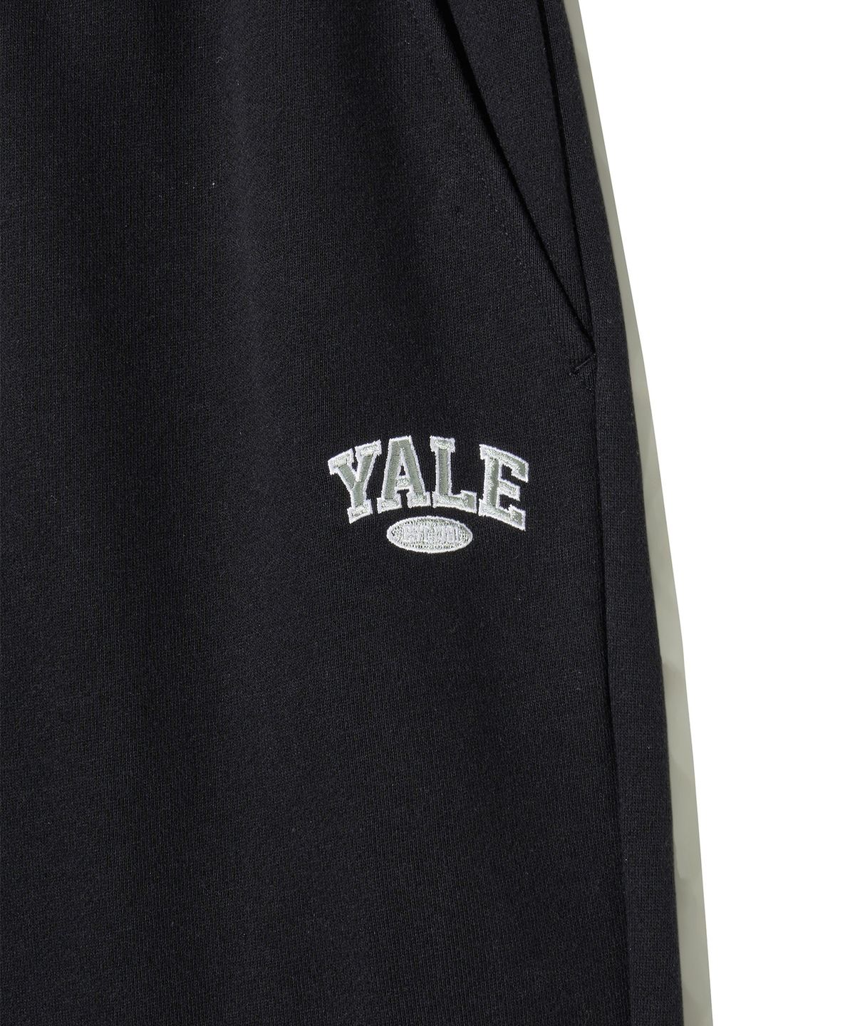예일(YALE) 스몰 투톤아치 스웨트 팬츠_블랙