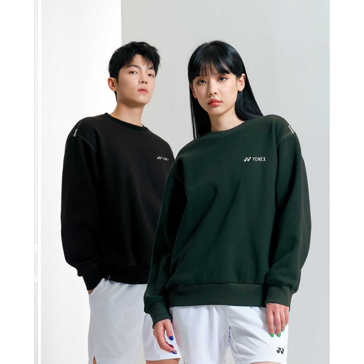 요넥스(YONEX) 243TL002U 블랙/다크 그린 공용 컬러 스티치 맨투맨