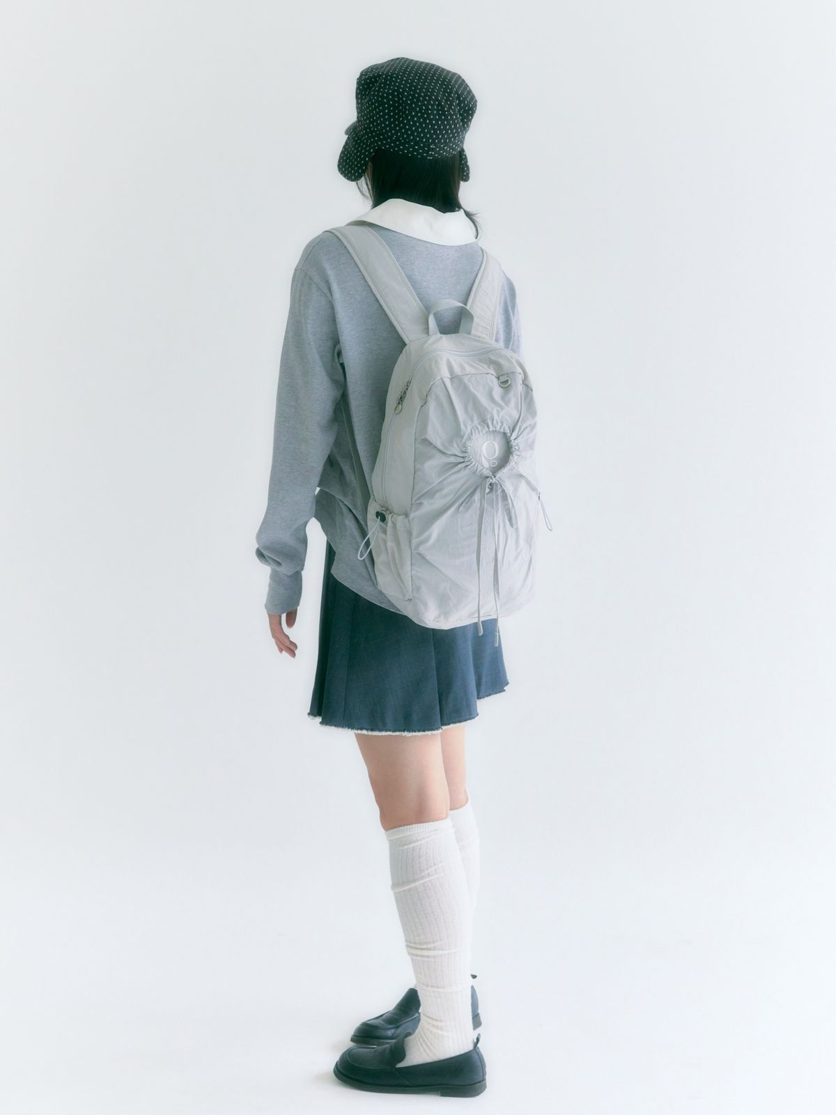 포이에(POIE) hole string PO backpack (light gray)