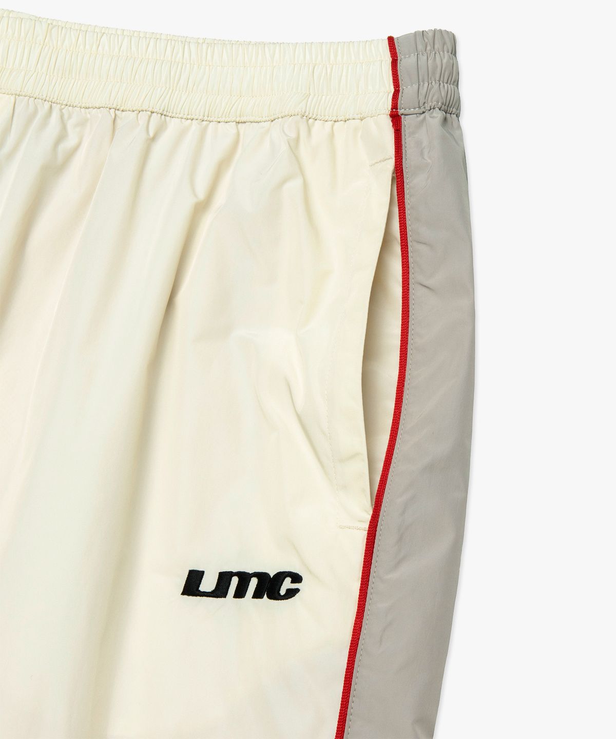 엘엠씨(LMC) RACING TRACK PANTS cream