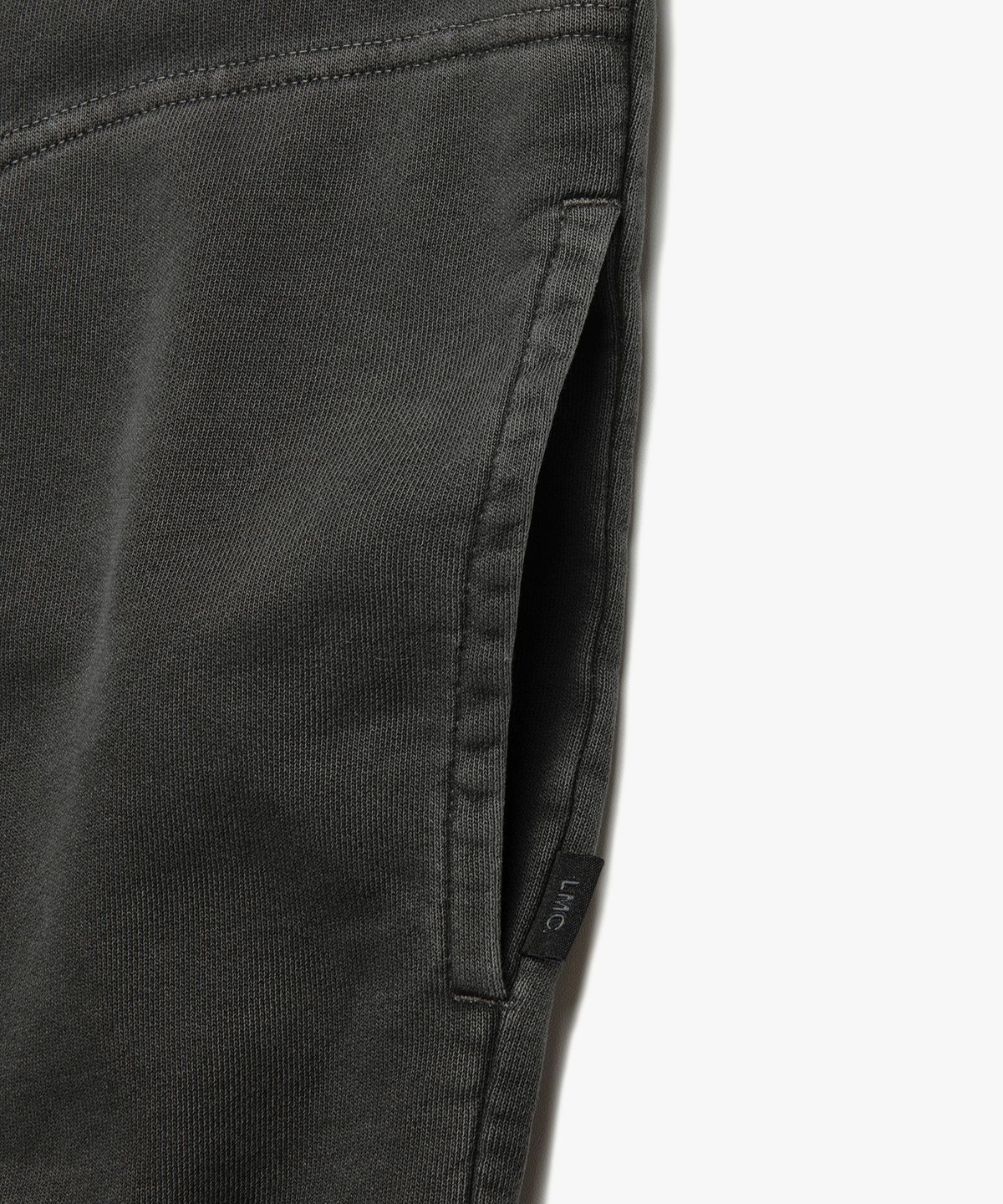 엘엠씨(LMC) PIGMENT DYED OVAL GLOBE HOODIE black