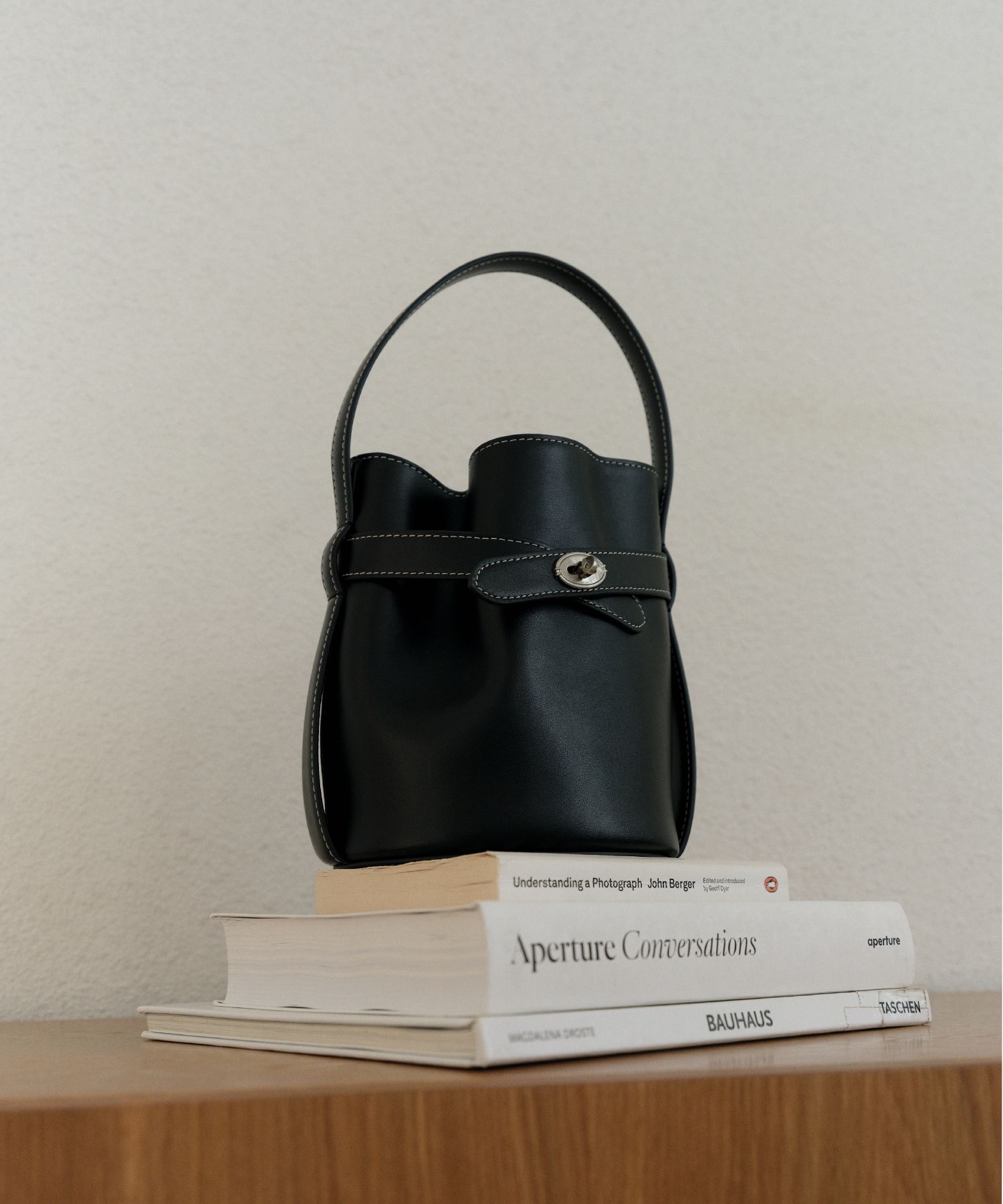 MUSINSA | OSTKAKA Classic Belt Bucket Bag Mini Black