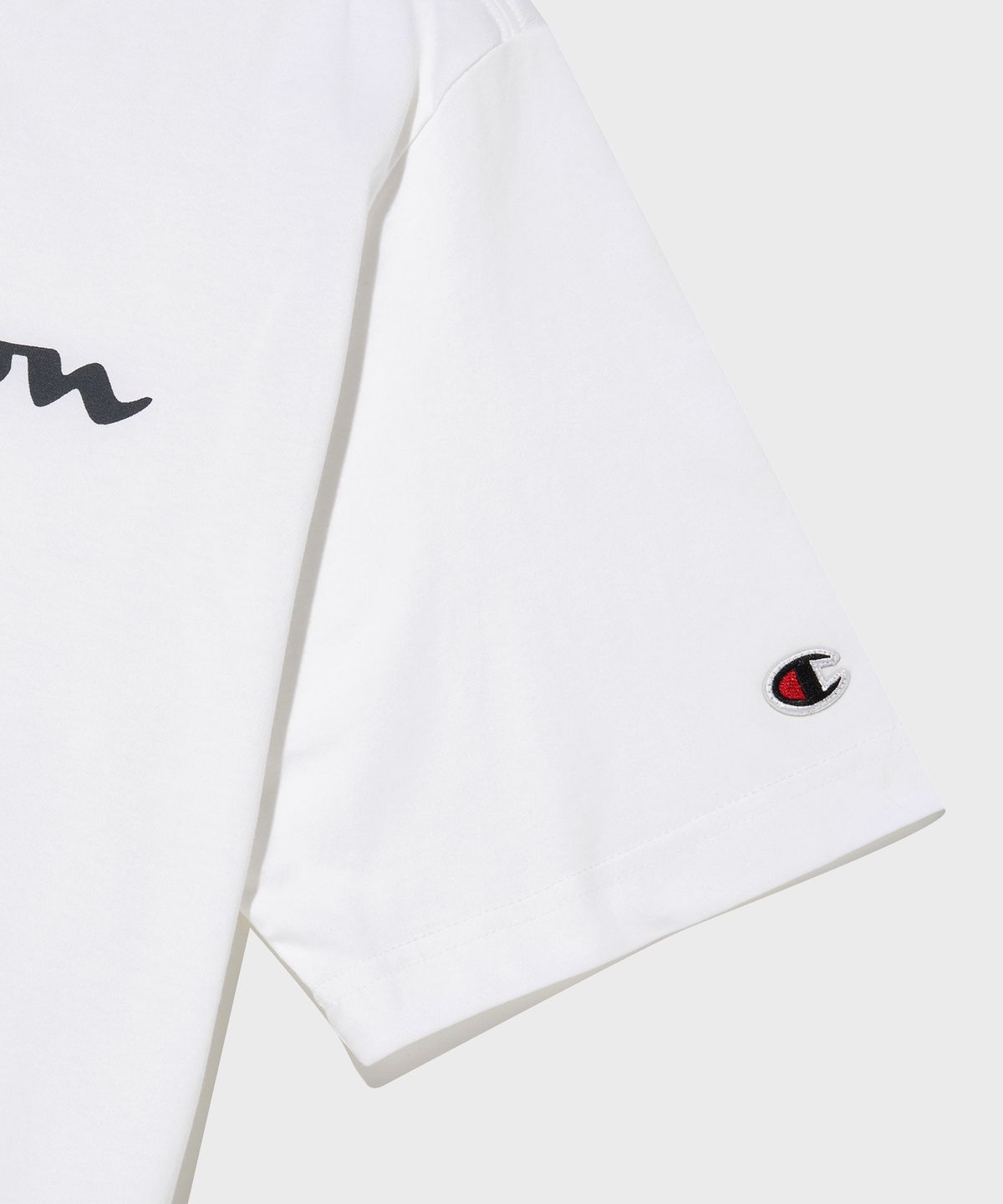 챔피온(CHAMPION) 빅 스크립트 로고 코튼 반팔 티셔츠 White