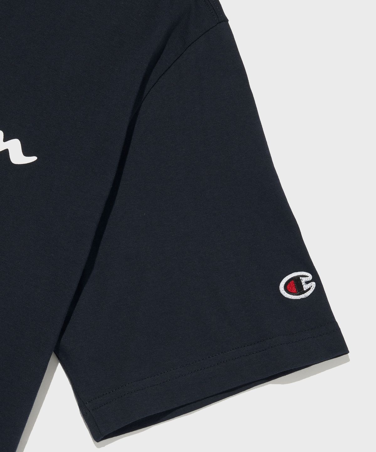 챔피온(CHAMPION) 빅 스크립트 로고 코튼 반팔 티셔츠 Normal Navy
