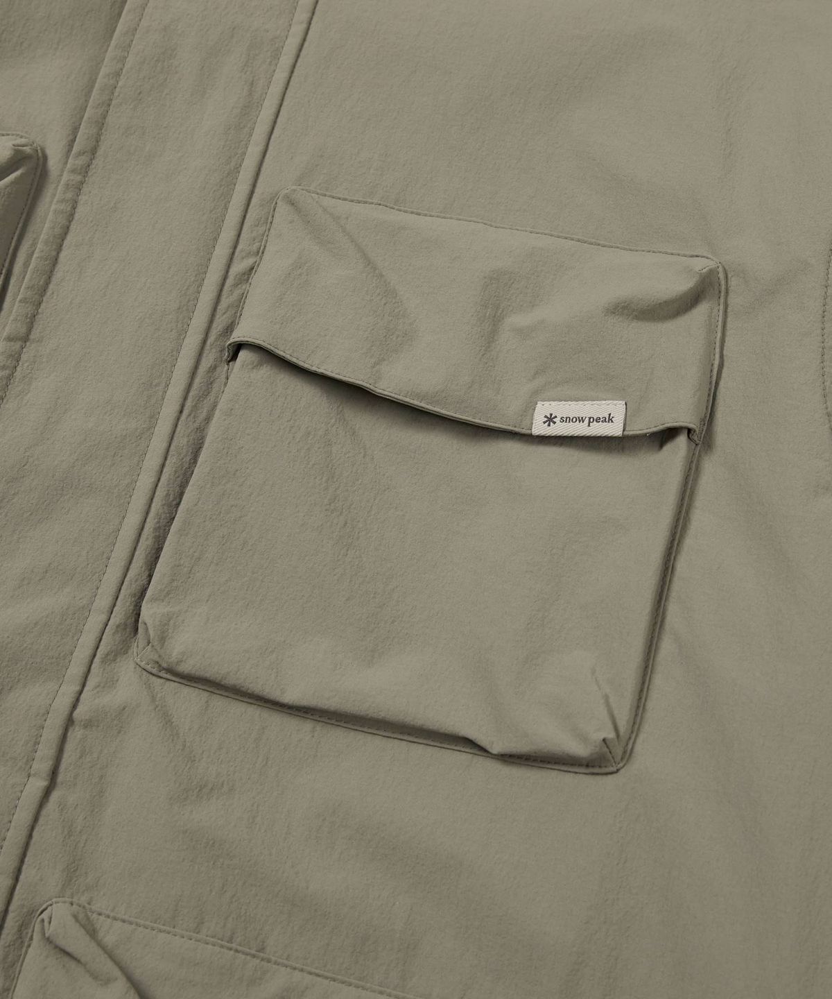 스노우피크 어패럴(SNOWPEAK APPAREL) 루트 유틸리티 바람막이 (S24FMRWB66) Khaki Gray
