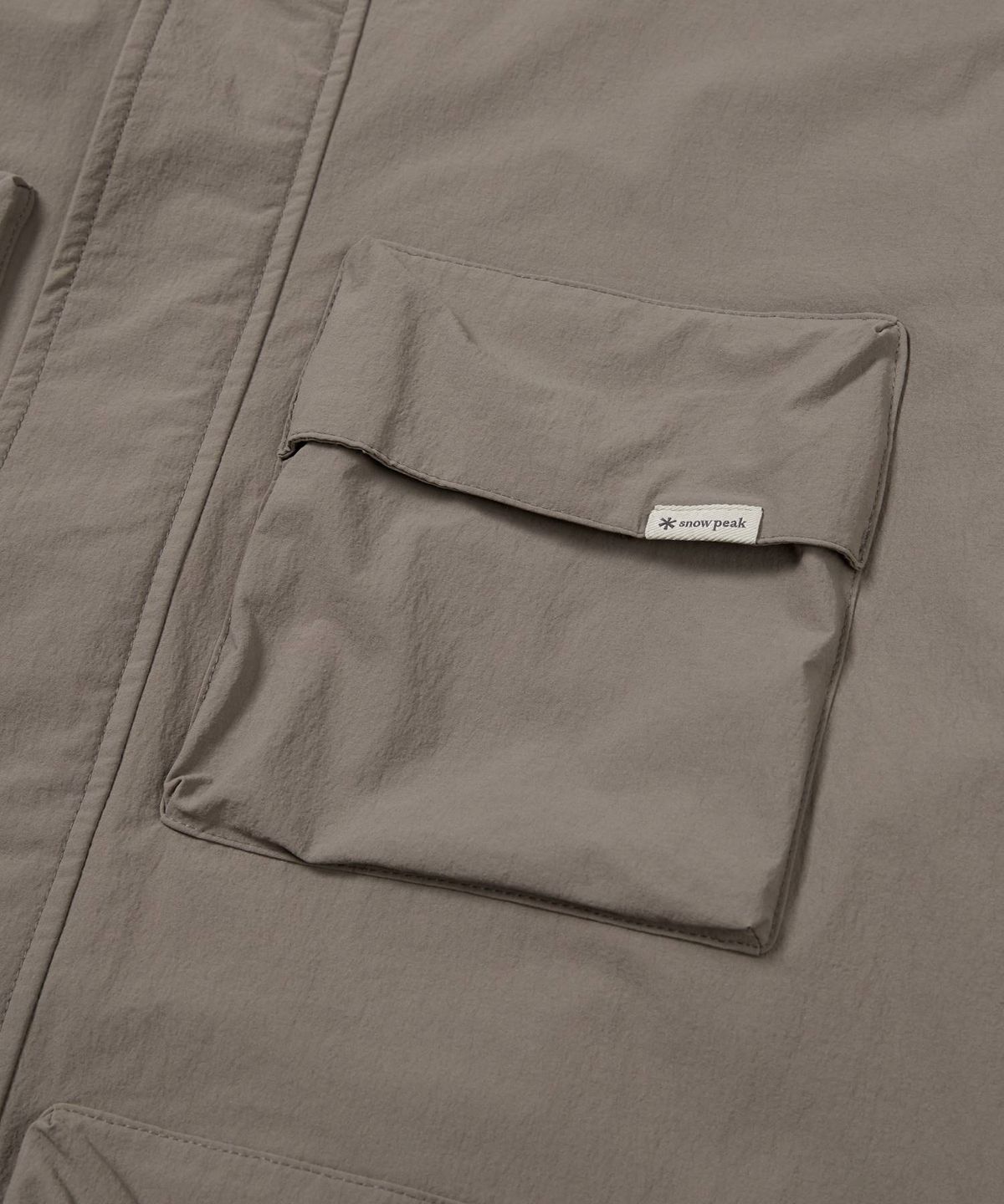 스노우피크 어패럴(SNOWPEAK APPAREL) 루트 유틸리티 바람막이 (S24FMRWB66) Dark Khaki