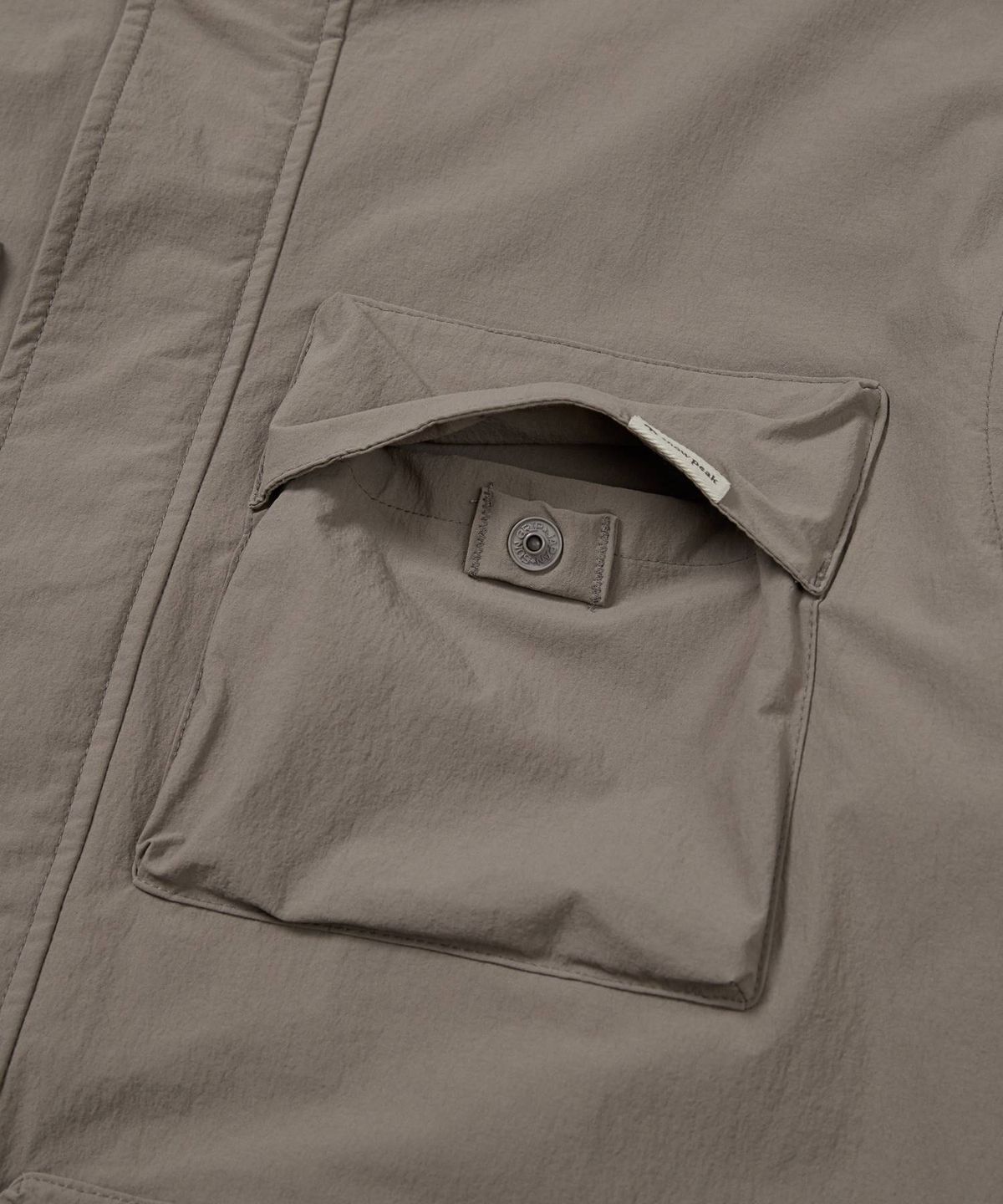 스노우피크 어패럴(SNOWPEAK APPAREL) 루트 유틸리티 바람막이 (S24FMRWB66) Dark Khaki
