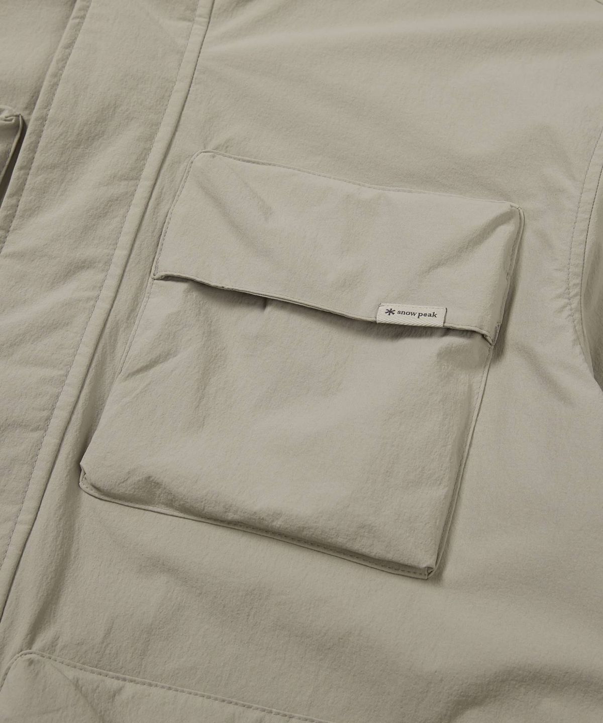 스노우피크 어패럴(SNOWPEAK APPAREL) 루트 유틸리티 바람막이 (S24FMRWB66) Beige Gray