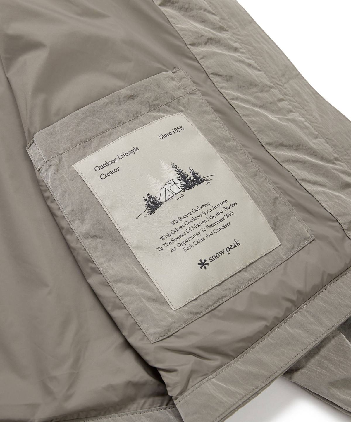 스노우피크 어패럴(SNOWPEAK APPAREL) 브라이트 여성 후드 바람막이 (S24FWFWB71) Tan Gray