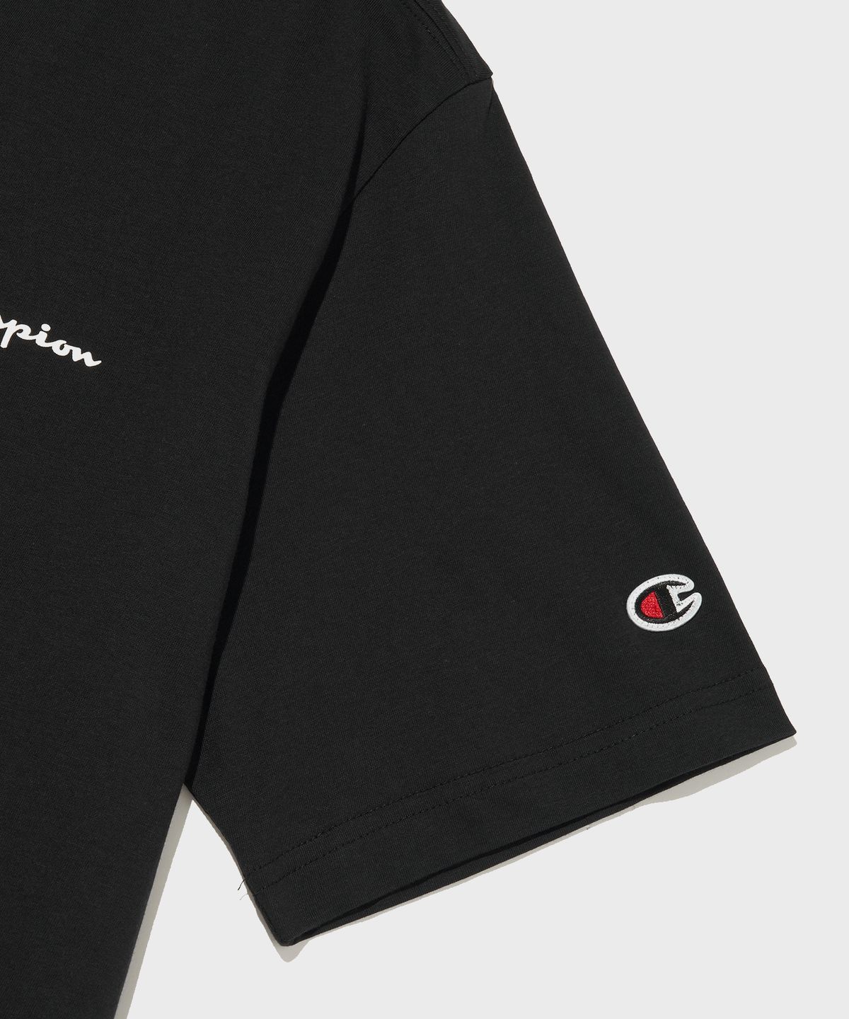 챔피온(CHAMPION) 스몰 스크립트 로고 코튼 반팔 티셔츠 Black