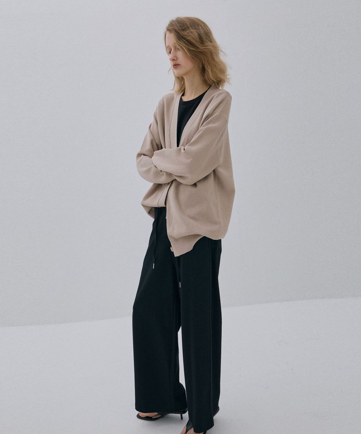 씨커슨(CKUSUN) TEXTURED OVAL KNIT CARDIGAN_BEIGE