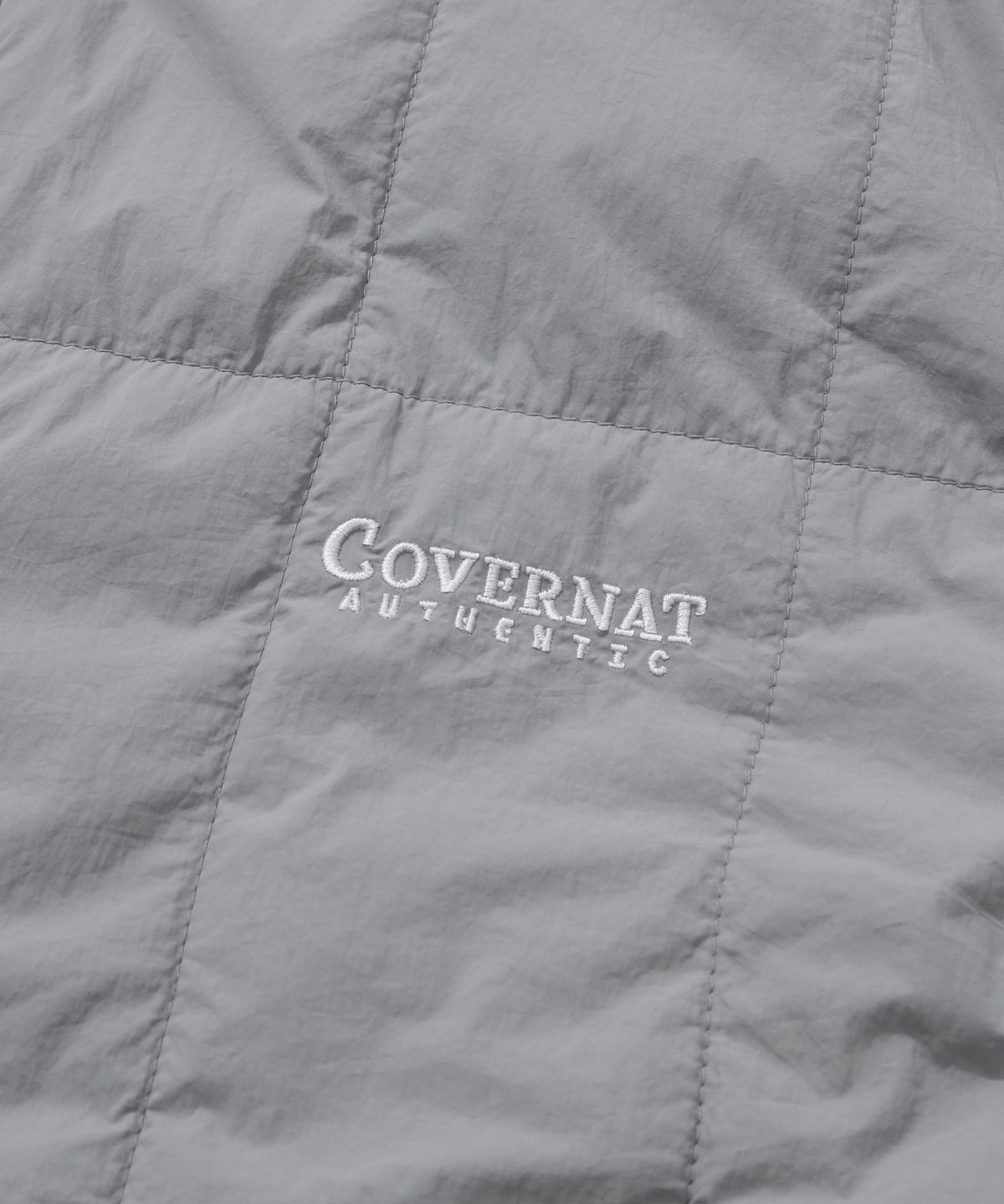 커버낫(COVERNAT) 플리스 리버서블 퀼팅 베스트 그레이