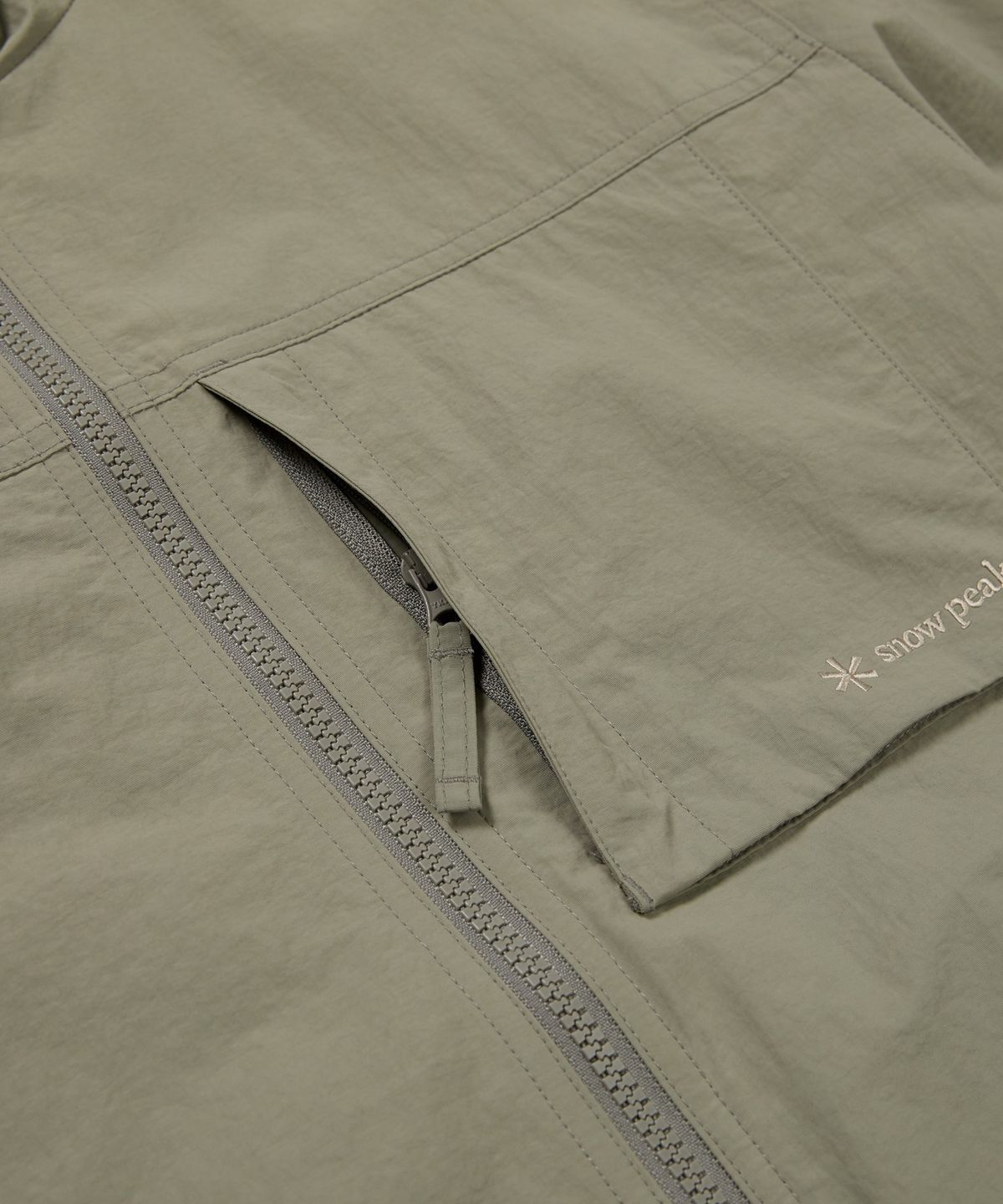 스노우피크 어패럴(SNOWPEAK APPAREL) 캠플 포켓 바람막이 (S24FMCWB12) Khaki Gray