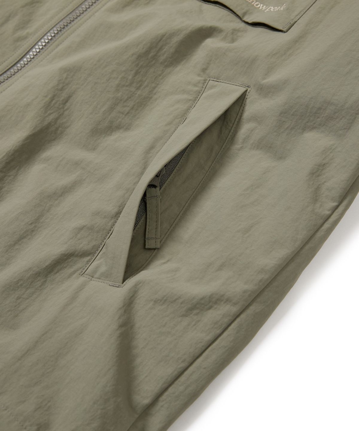 스노우피크 어패럴(SNOWPEAK APPAREL) 캠플 포켓 바람막이 (S24FMCWB12) Khaki Gray